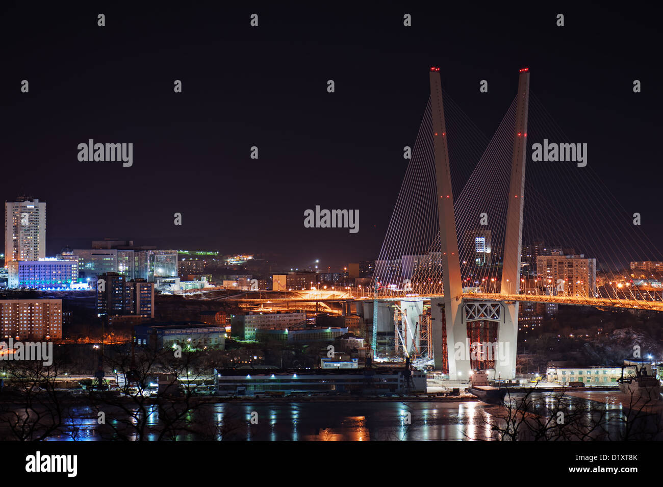 night view of the bridge in the Russian Vladivostok over the Golden Horn bay Stock Photo