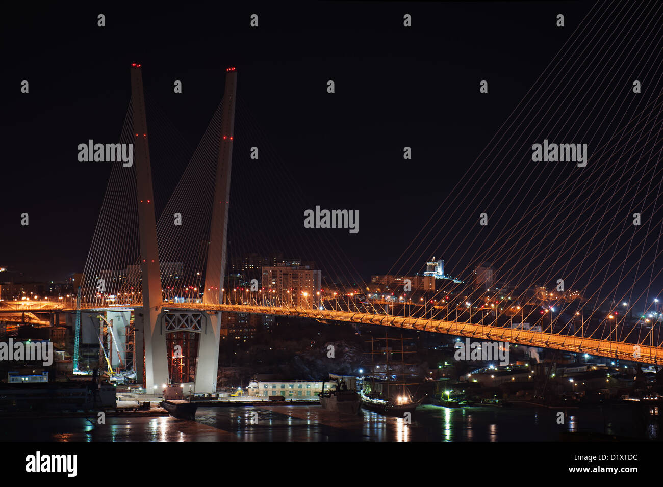 night view of the bridge in the Russian Vladivostok over the Golden Horn bay Stock Photo