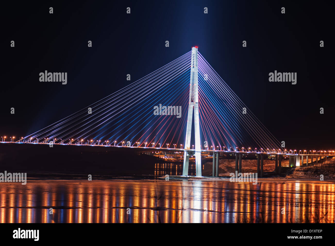 night view of the longest cable-stayed bridge in the world in the Russian Vladivostok over the Eastern Bosphorus strait Stock Photo