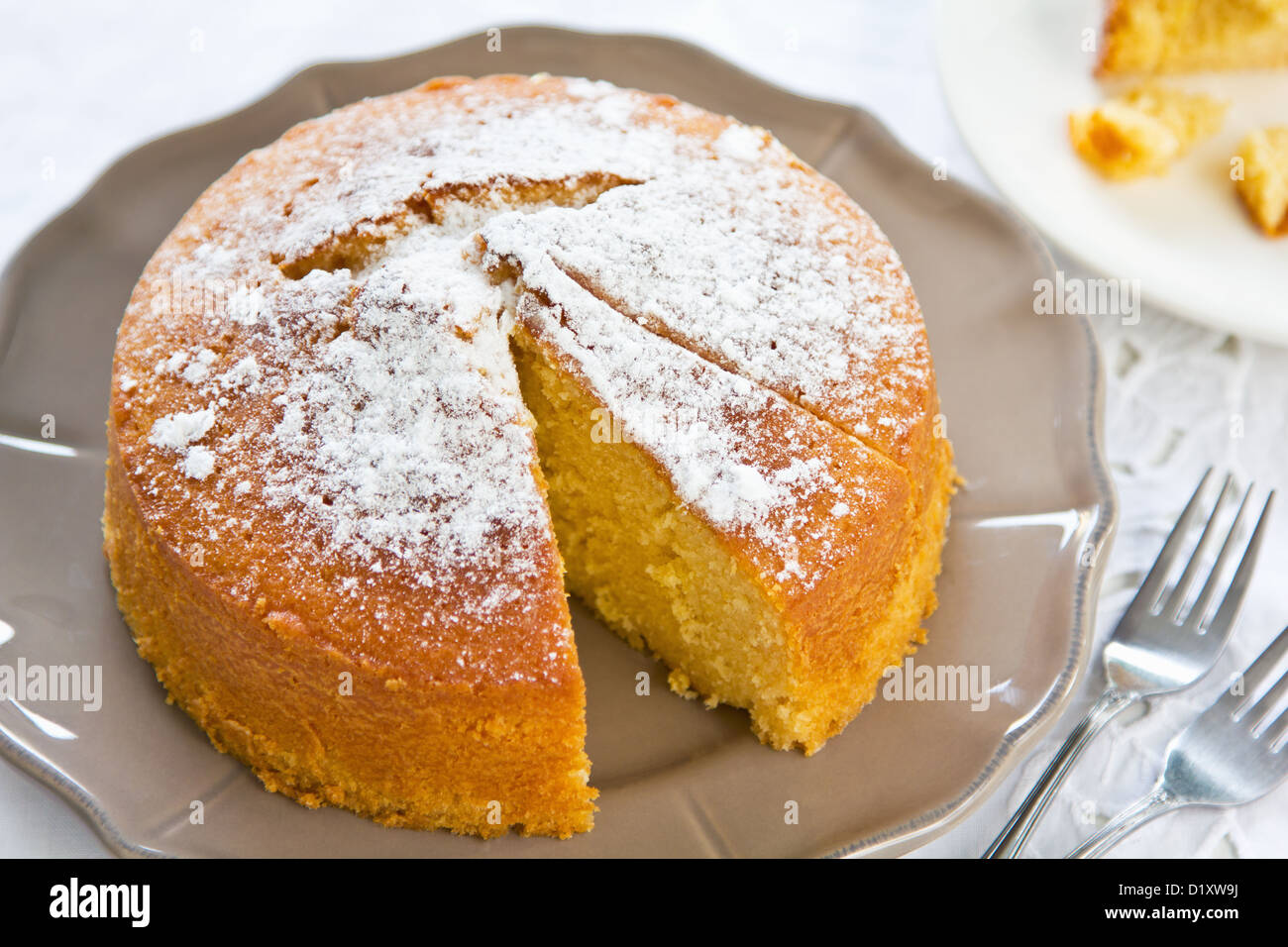 Butter cake with orange zest and juice by coffee Stock Photo Alamy