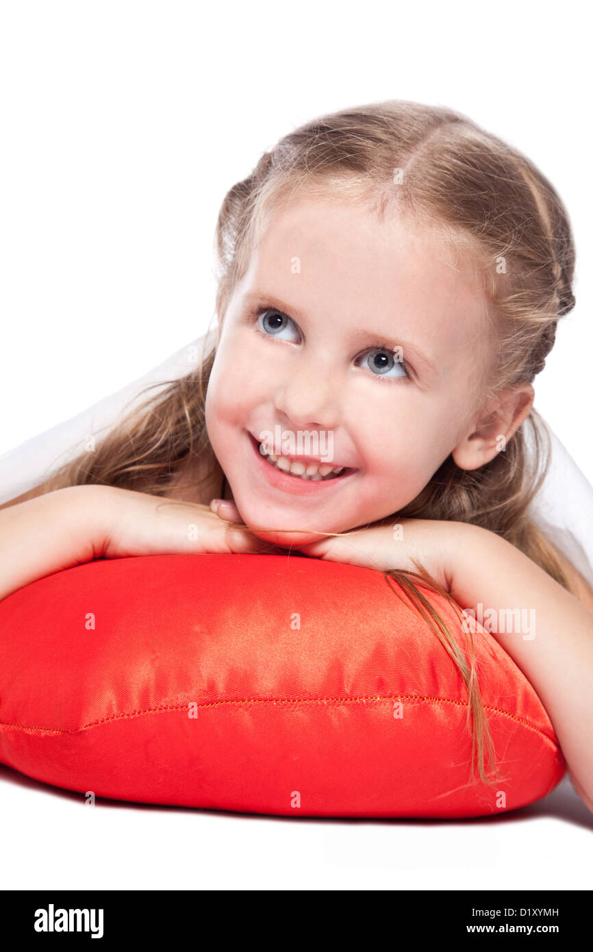 Smiling little girl lying on pillow Cut Out Stock Images & Pictures Alamy