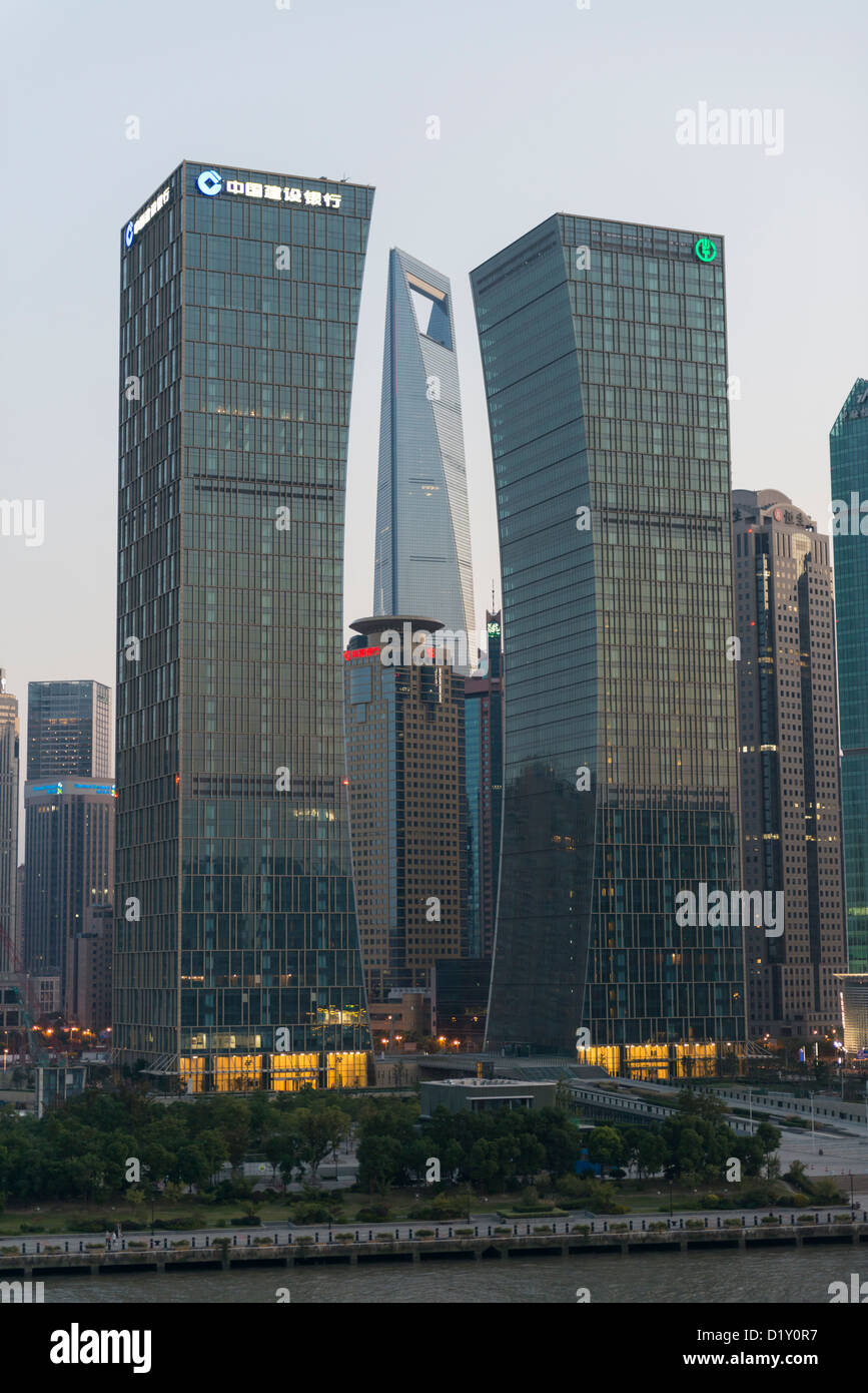 Pu Jiang Shuanghui Buildings and Shanghai World Financial Centre on the banks of the Huangpu River, Lujiazui, Pudong Stock Photo