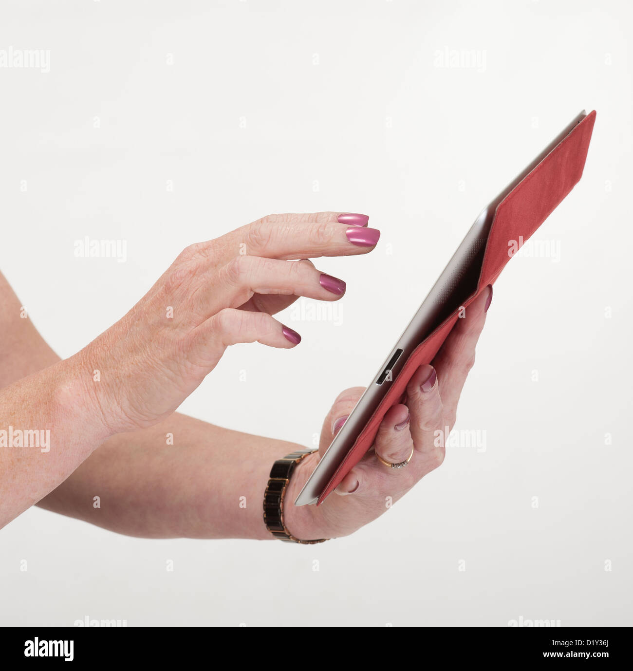 Woman using an Ipad handheld device Stock Photo Alamy