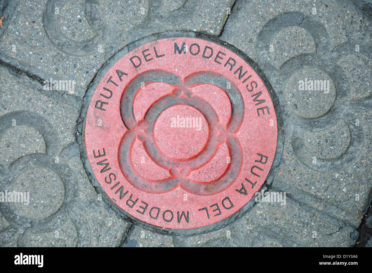 Spain, Catalonia, Barcelona. Ruta del Modernisme / Art Nouveau Route. Plaque built into pavement Stock Photo