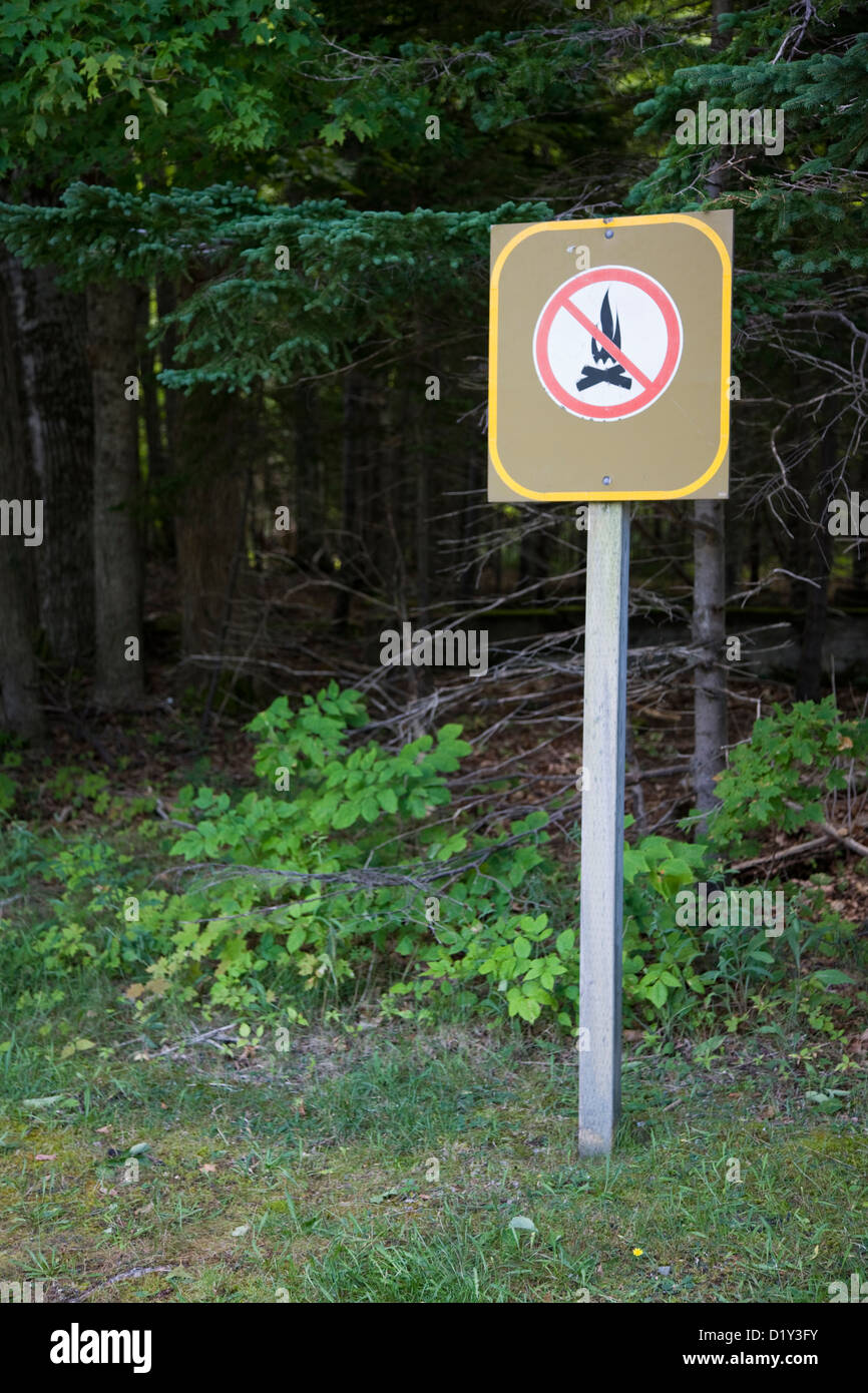 Sign warning of fire risk from camp fires in the woods, Cape Breton, Nova Scotia Stock Photo
