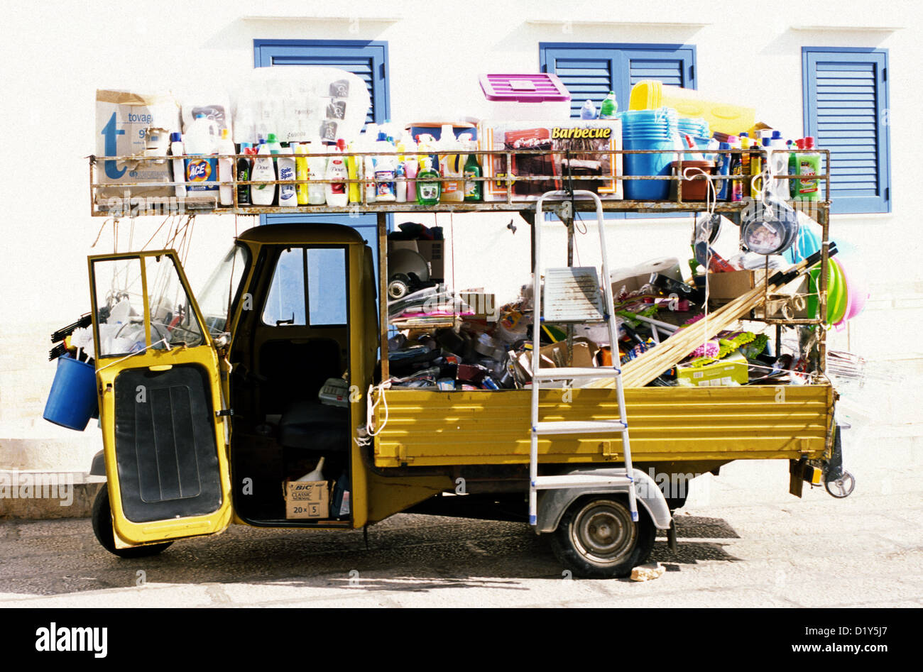 ape car full of different kind of product, Marettimo island Sicily, Italy Stock Photo