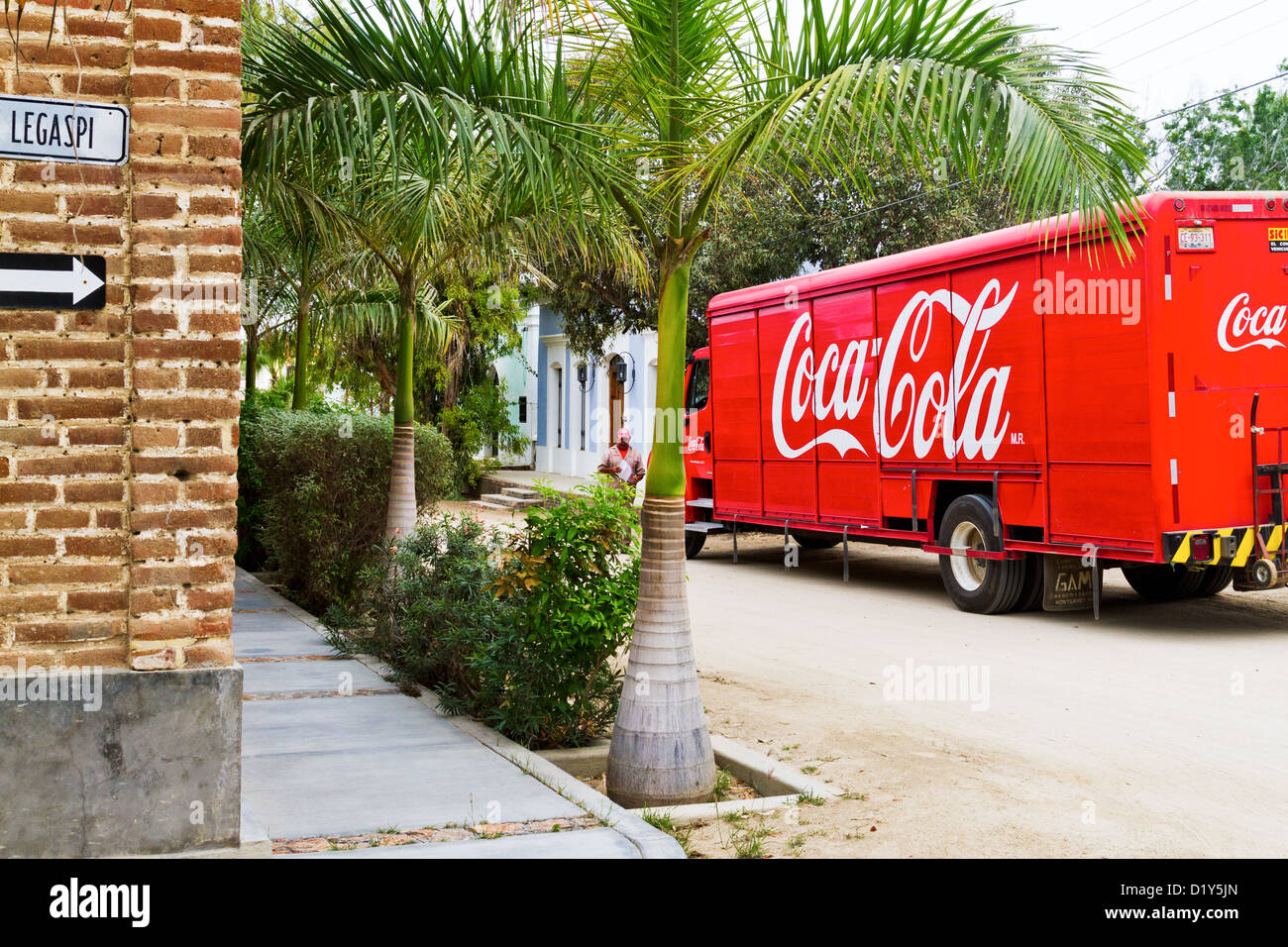 A Coca Cola truck is parked on a picturesque street in Todos Santos, Baja, Mexico Stock Photo