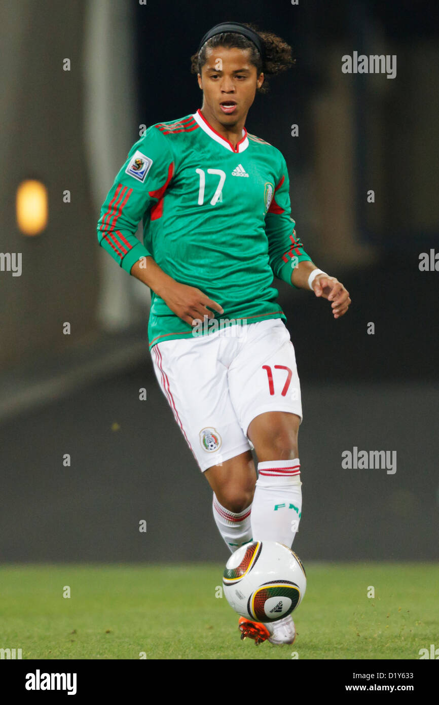 Giovani Dos Santos of Mexico on the ball during the FIFA World Cup round of 16 match against Argentina at Soccer City Stadium. Stock Photo