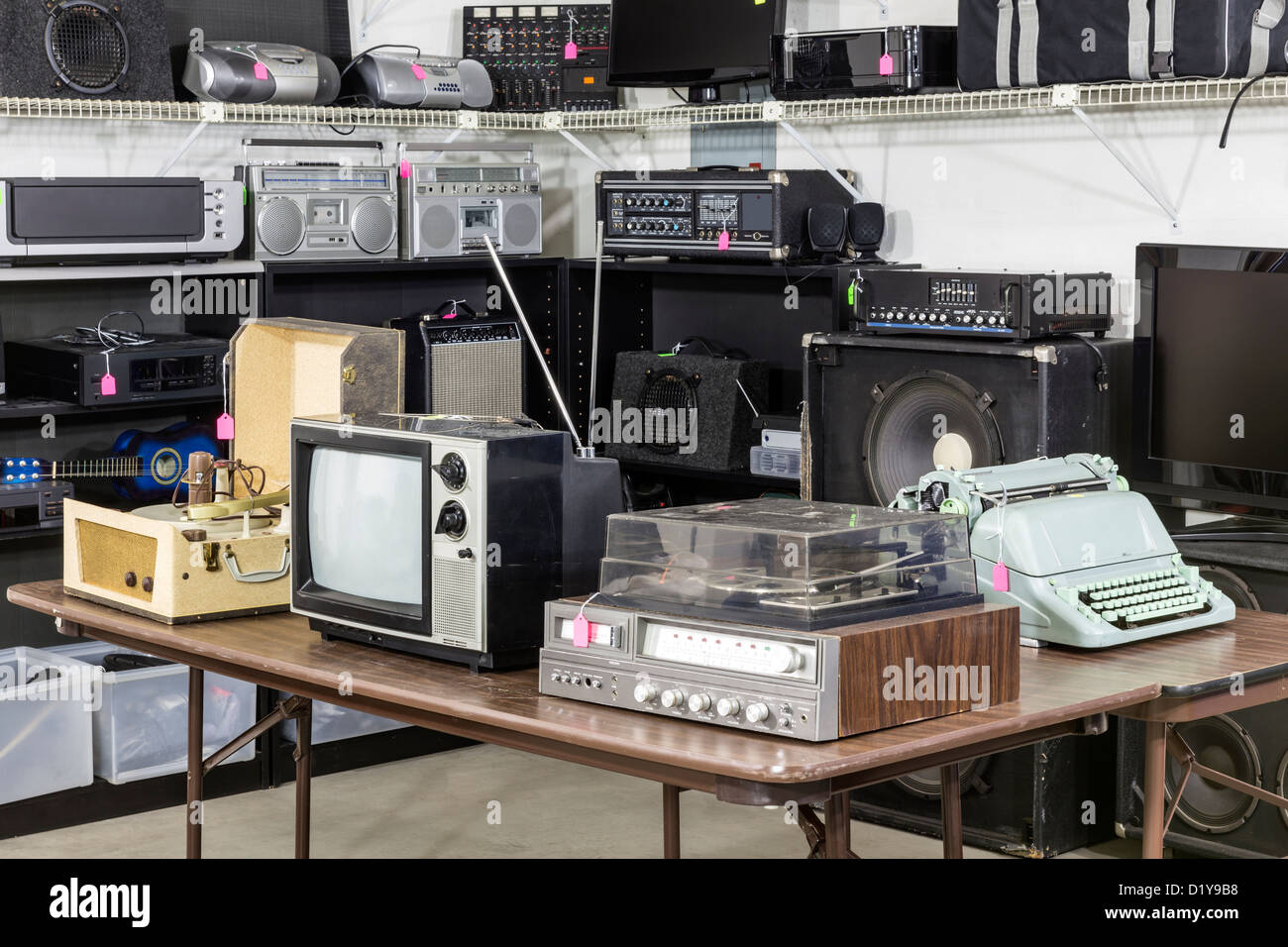 Vintage consumer electronics inside a funky thrift antique store Stock Photo