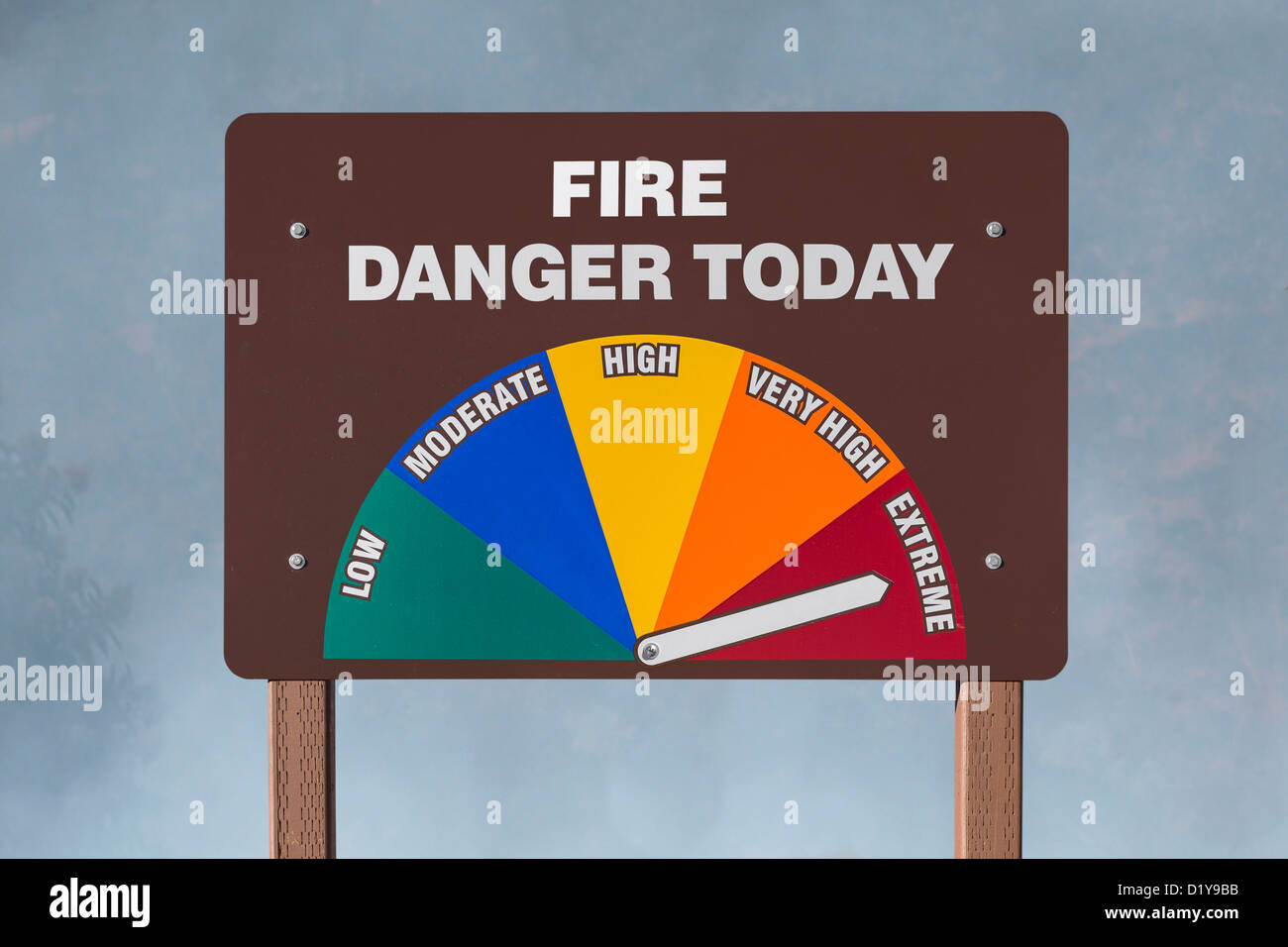 Extreme fire danger today sign with smoke background. Stock Photo