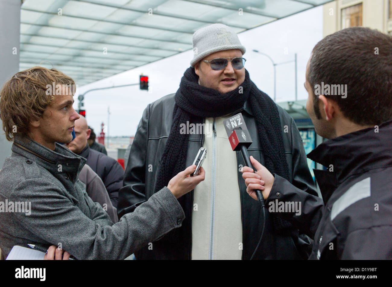 Mega Upload founder Kim Dotcom being interviewed during the TVNZ Funeral March to protest the closure of TVNZ7 Stock Photo