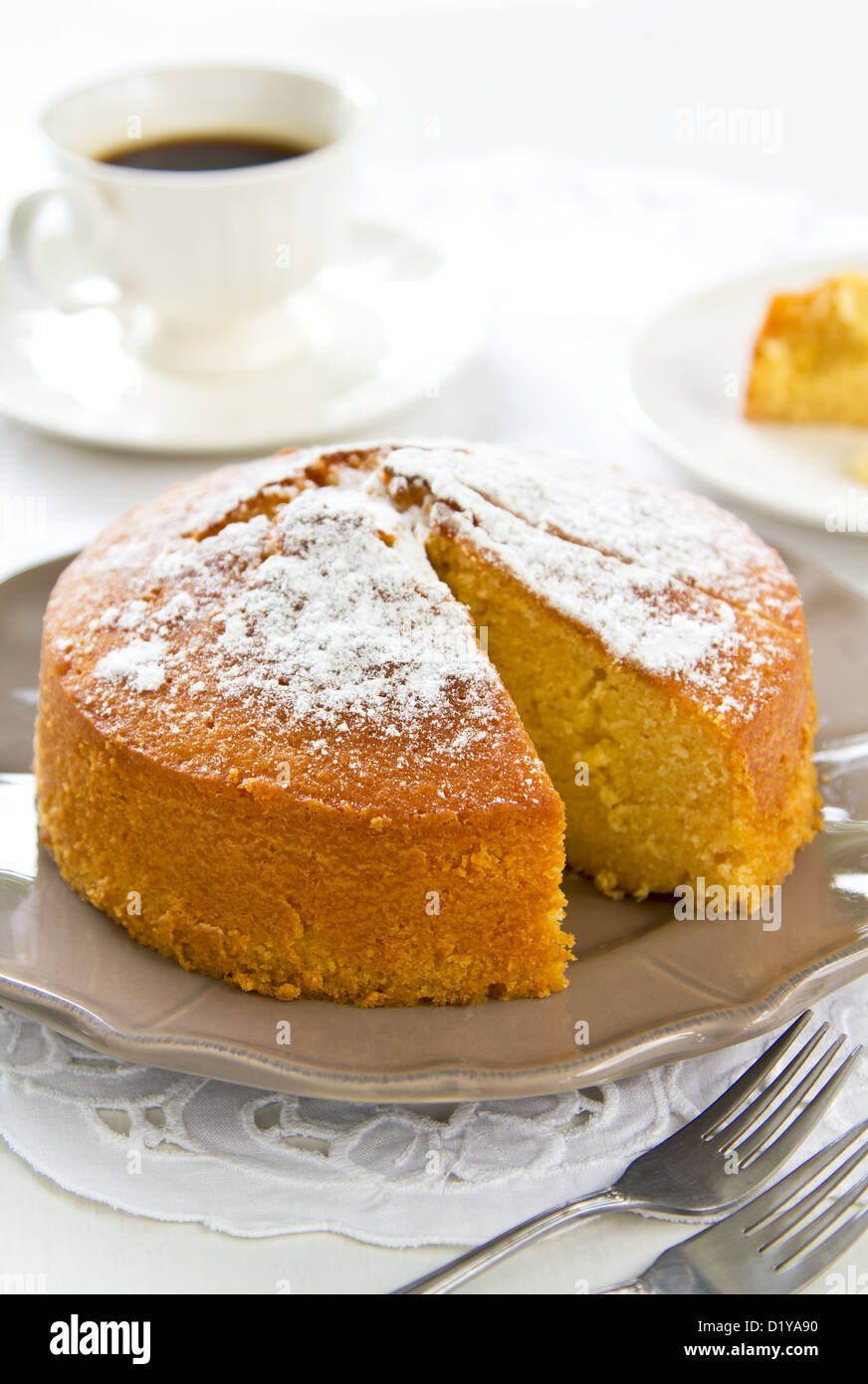 Butter cake with orange zest and juice by coffee Stock Photo Alamy