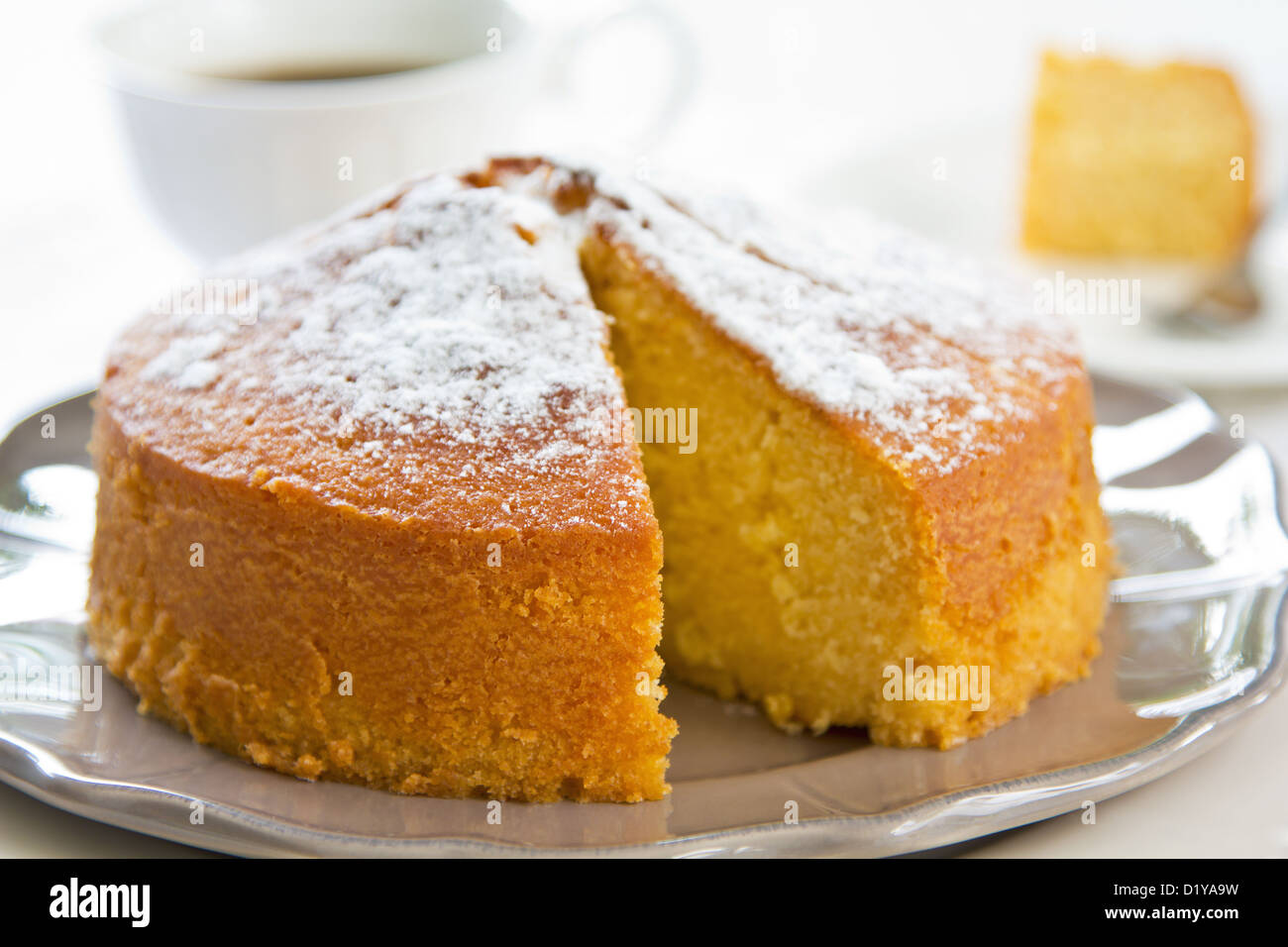 Butter cake with orange zest and juice by coffee Stock Photo Alamy