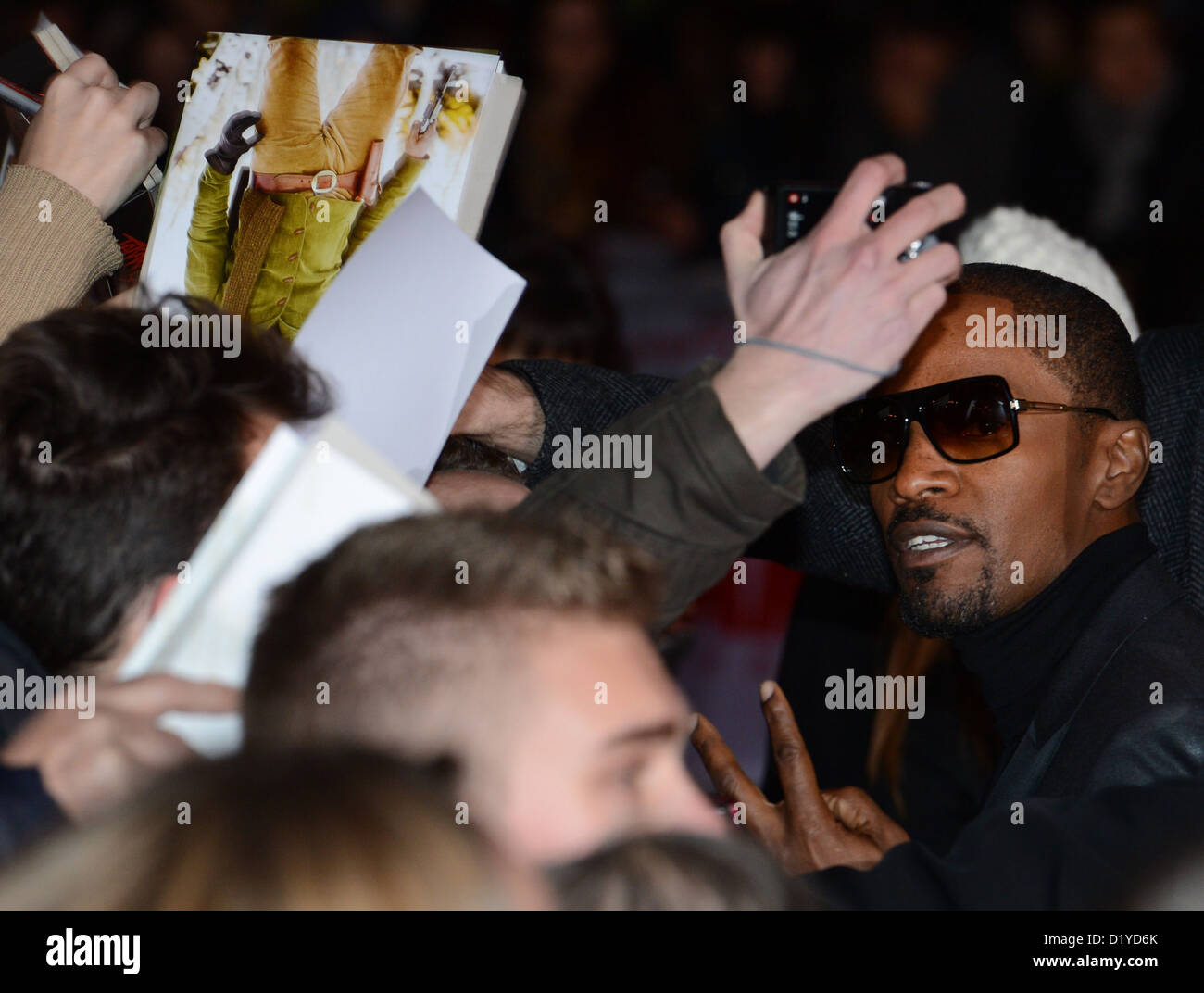 US actor Jamie Foxx (R) arrives for the premiere of 'Django Unchained' at Cinestar cinemas in Berlin, Germany, 08 January 2013. The film should be released in German cinemas on 17 January 2013. Photo: Jens Kalaene Stock Photo