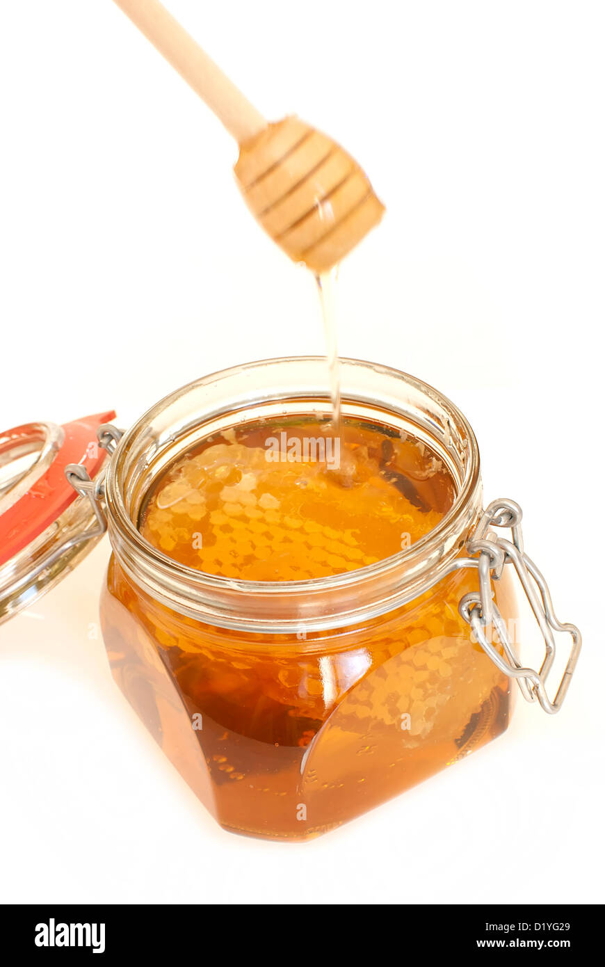 healthy organic honey in a jar isolated on white background Stock Photo Alamy