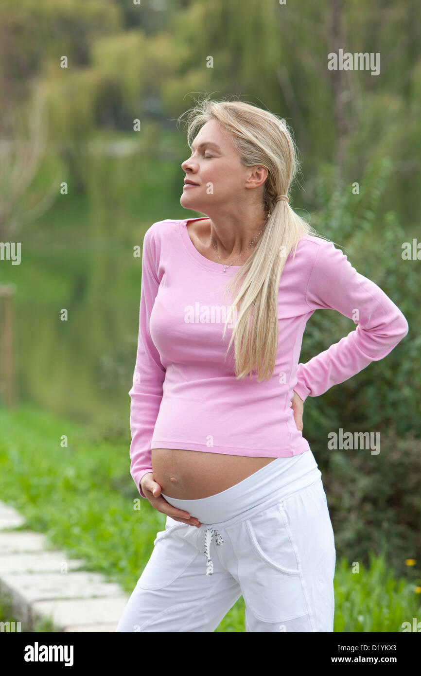 pregnant woman in the park Stock Photo - Alamy
