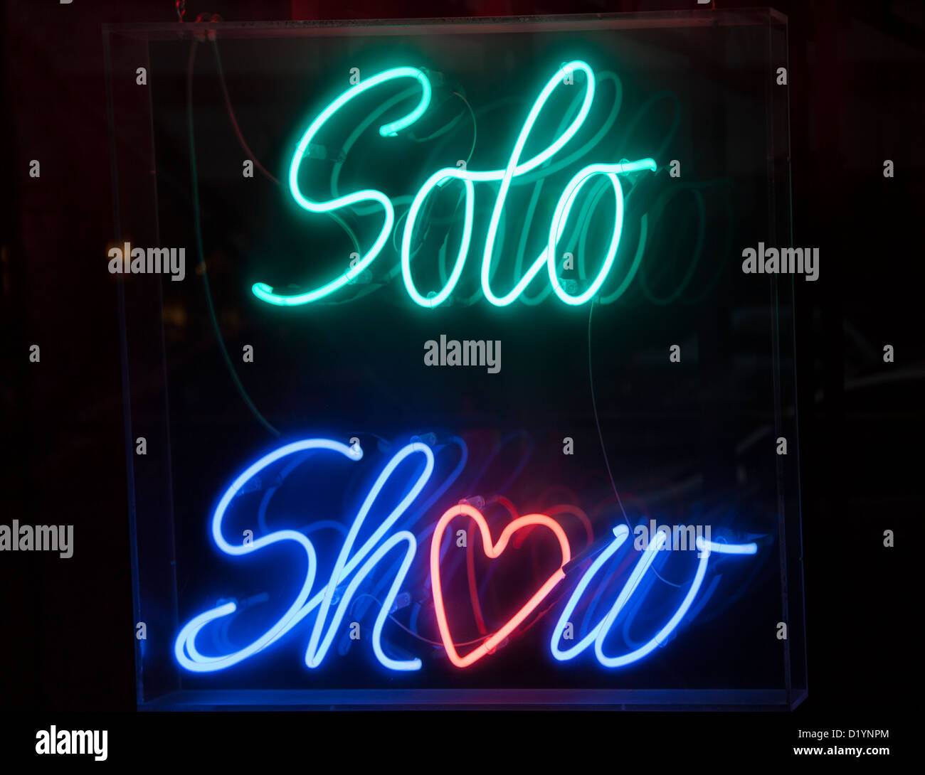 Neon sign of a striptease club,Soho,London Stock Photo