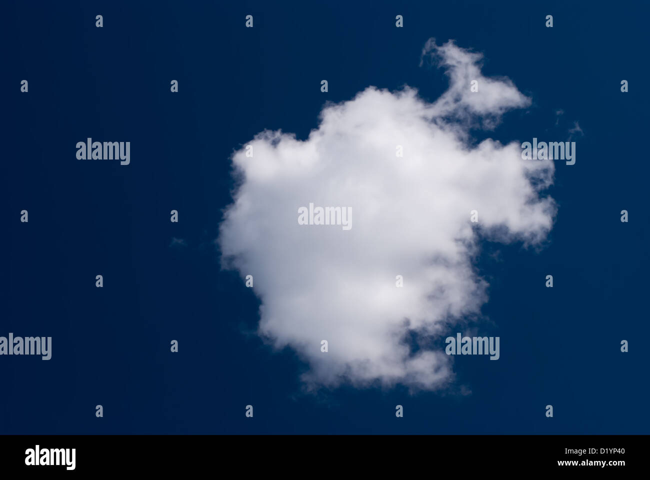 Small cloudlet. Cloud on dark blue sky. Using a polarizing filter when shooting gave deep blue sky Stock Photo