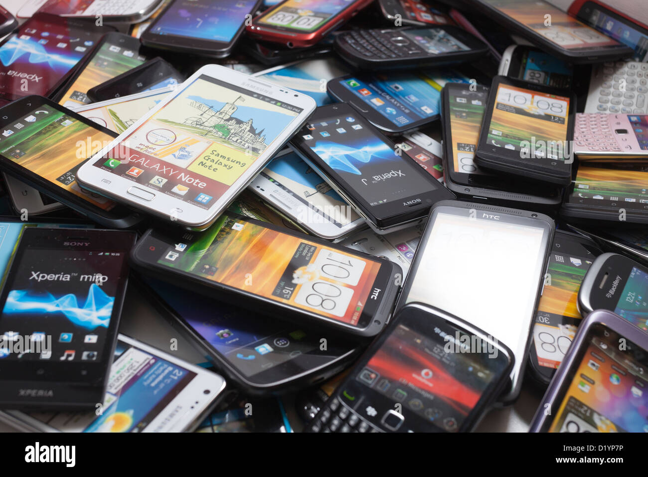 Pile of mobile phones. Stock Photo