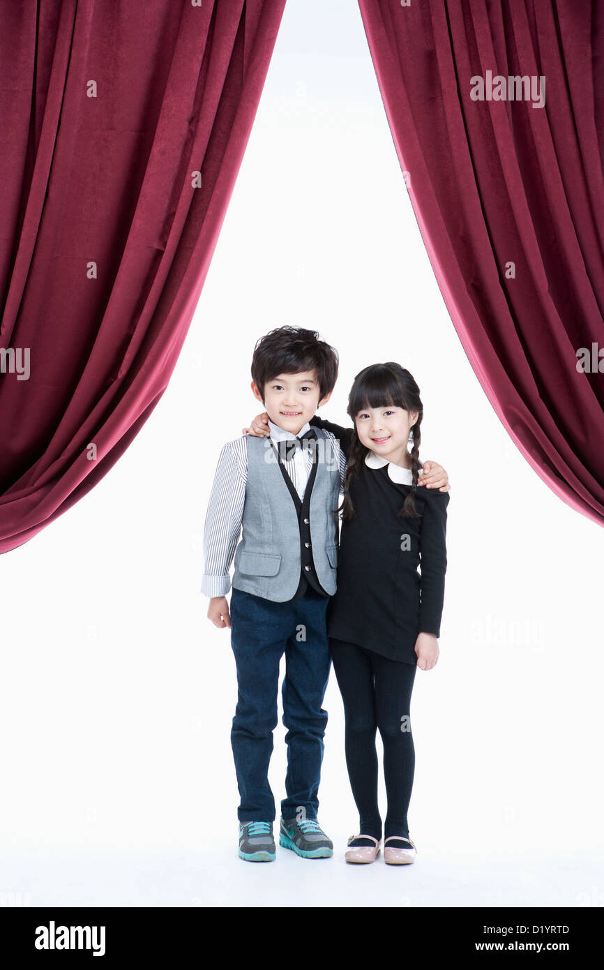Children standing arms around other hi-res stock photography and images ...