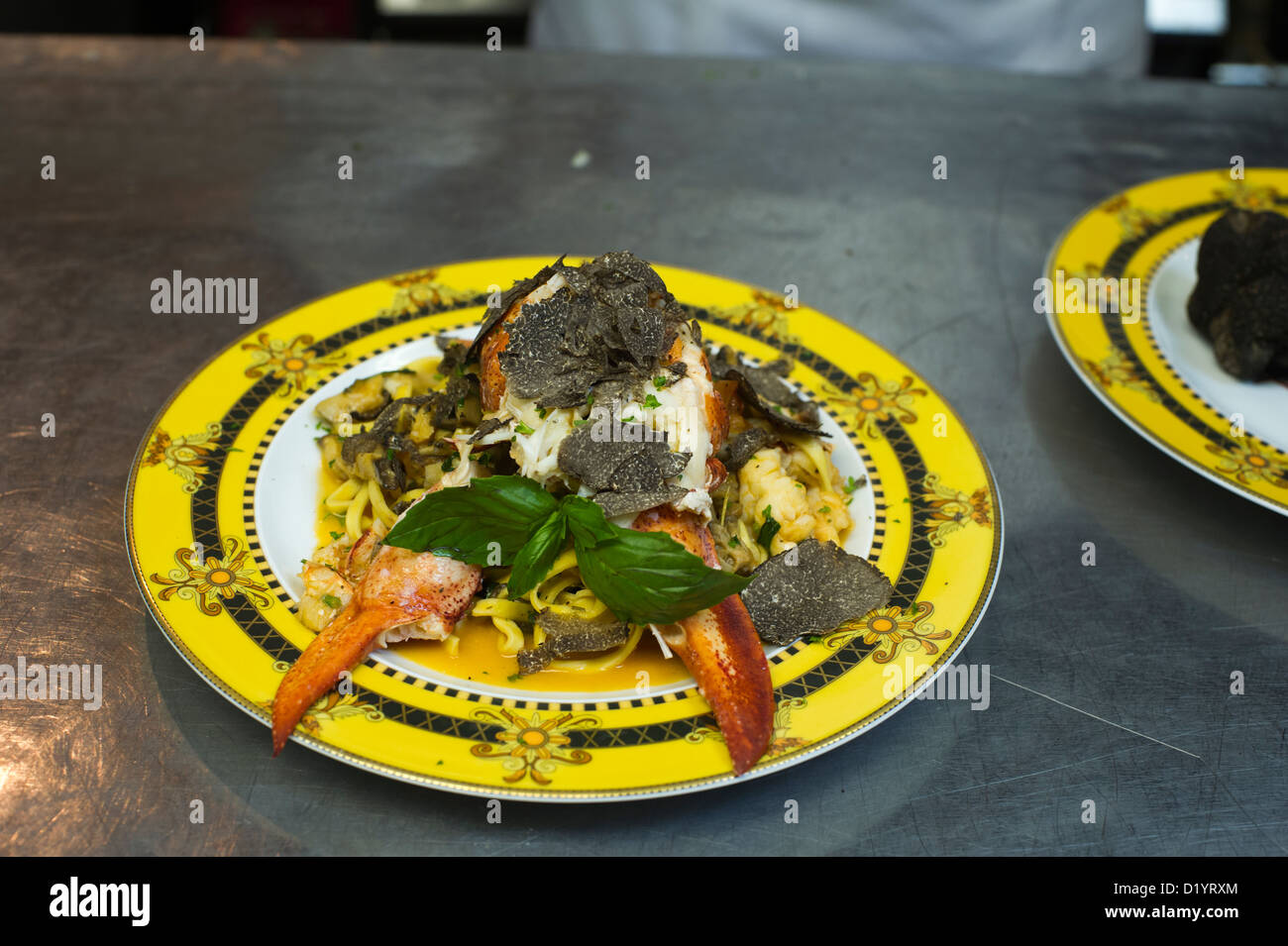 Lobster and winter black truffle shavings four course prix fixe menu at Bice Ristorante Stock Photo