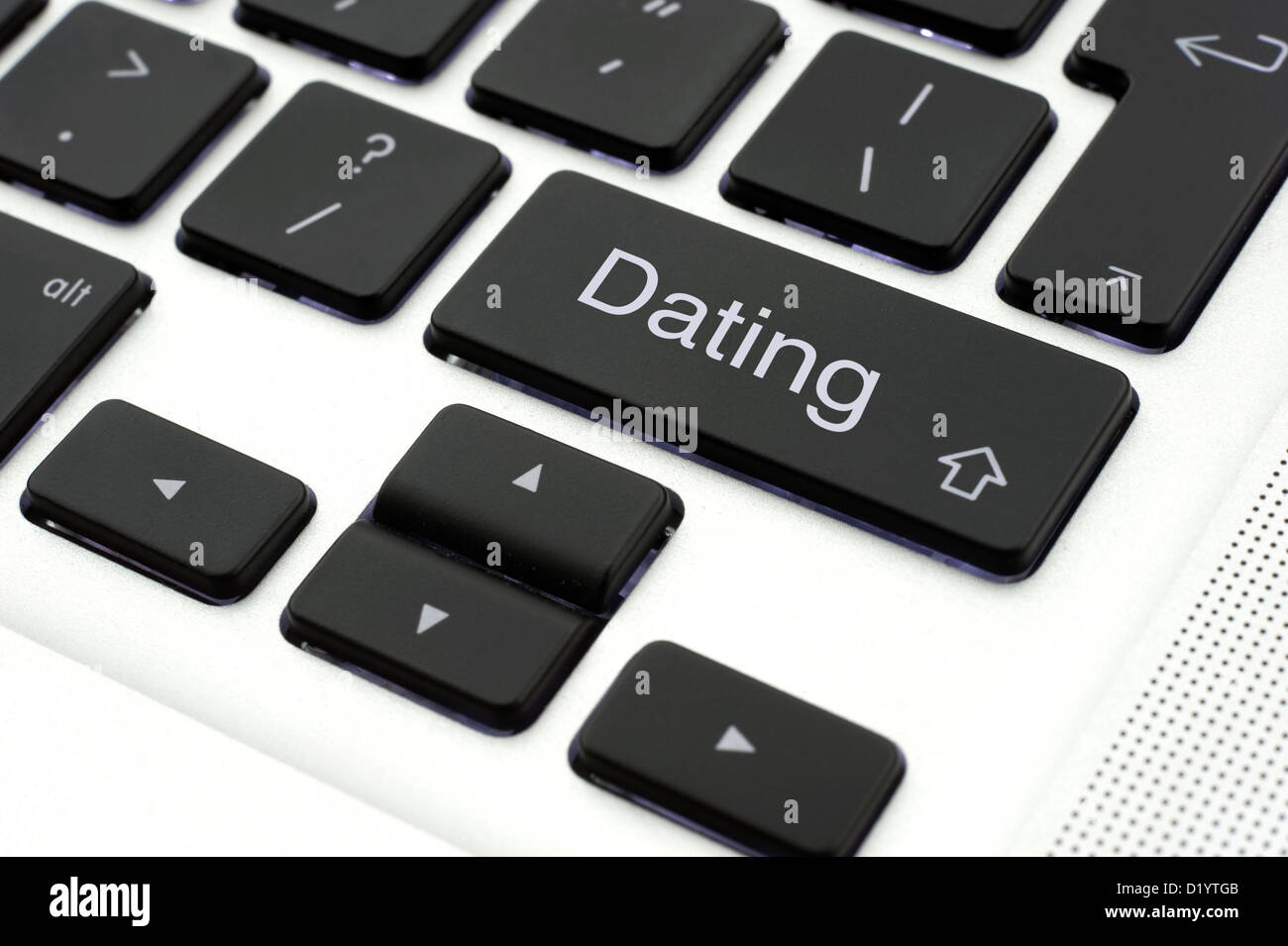 Dating button on the keypad of a laptop Stock Photo