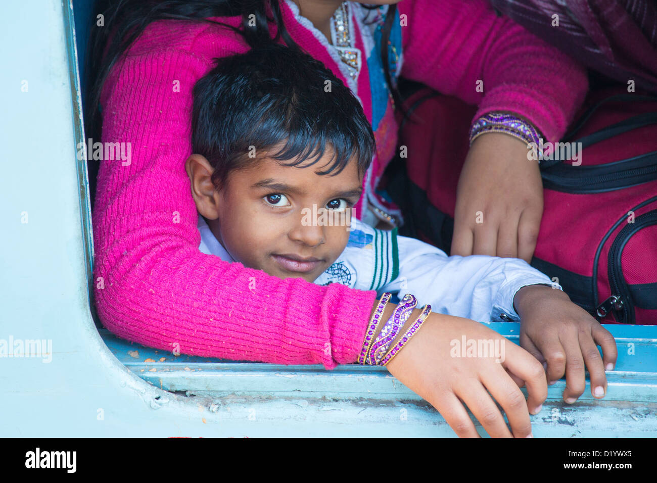 Indian boy on a train in New Delhi Railway Station, New Delhi, India Stock Photo