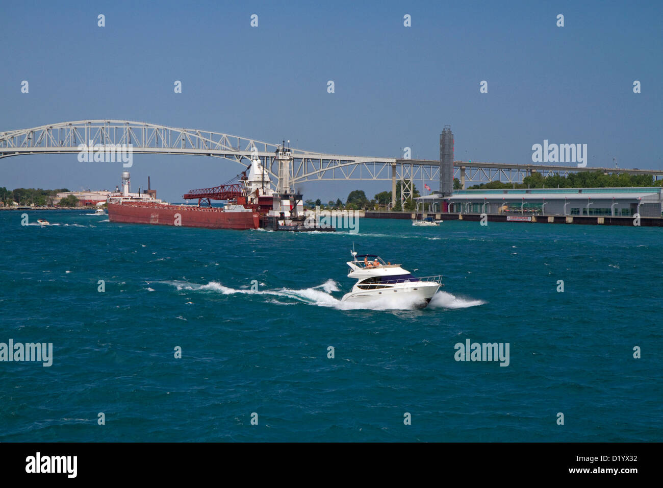 The Blue Water Bridge spanning the St. Clair River connects Port Huron, Michigan with Sarnia, Ontario, Canada. Stock Photo