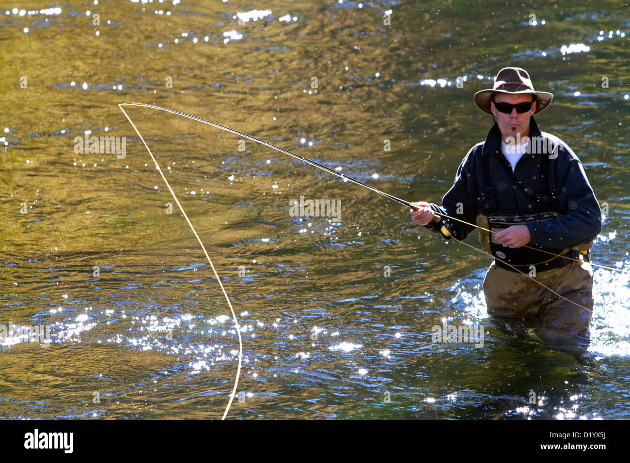 Angler fly fishing on the South Fork of the Boise River in