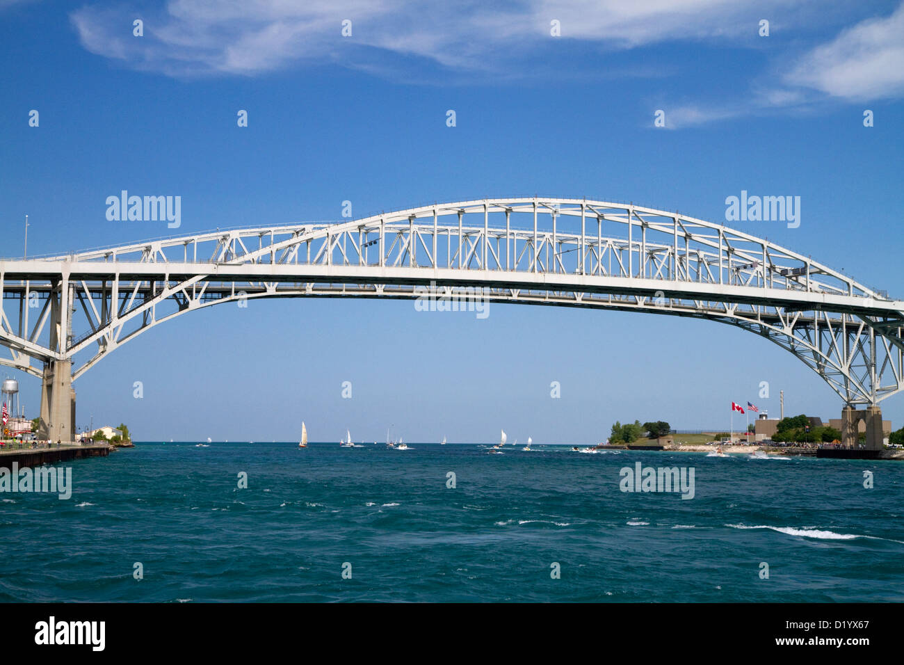 The Blue Water Bridge spanning the St. Clair River connects Port Huron, Michigan with Sarnia, Ontario, Canada. Stock Photo