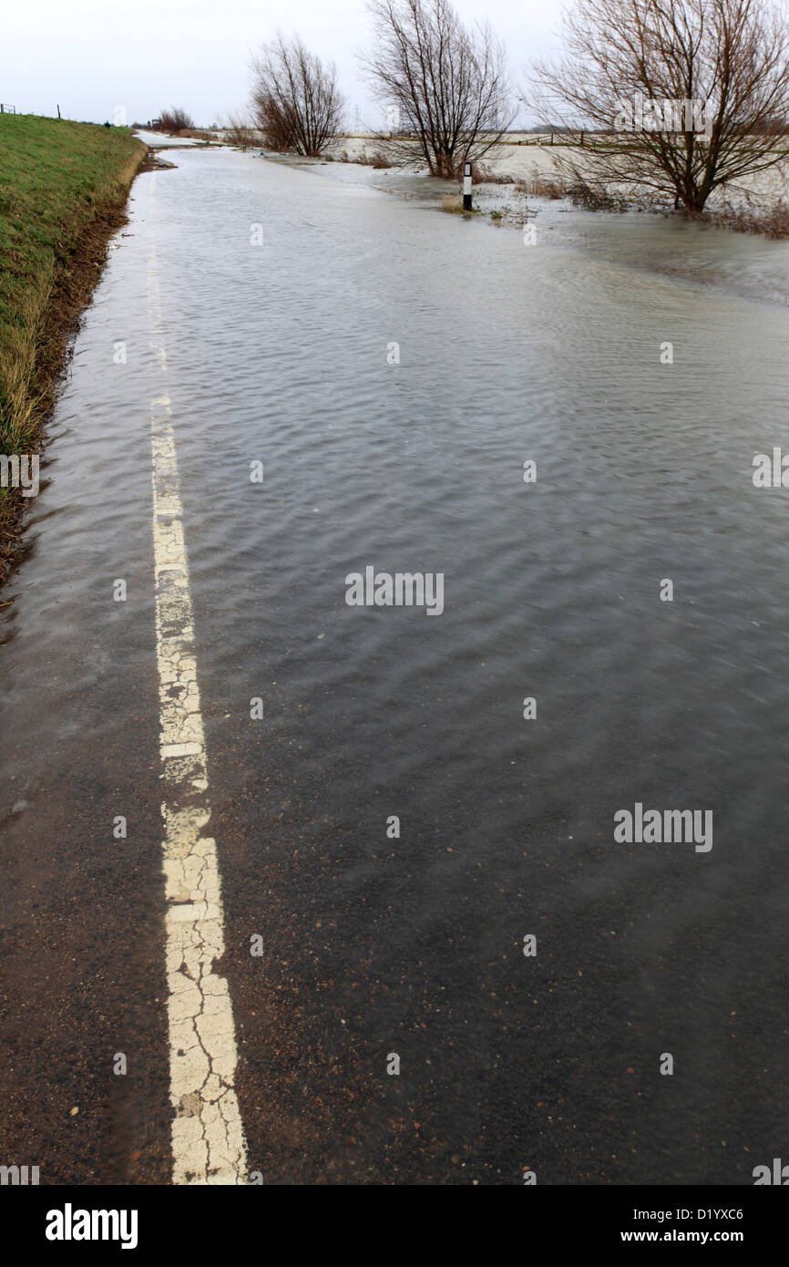 View of the flooded river Nene over the B1040 road, Whittlesey Washes