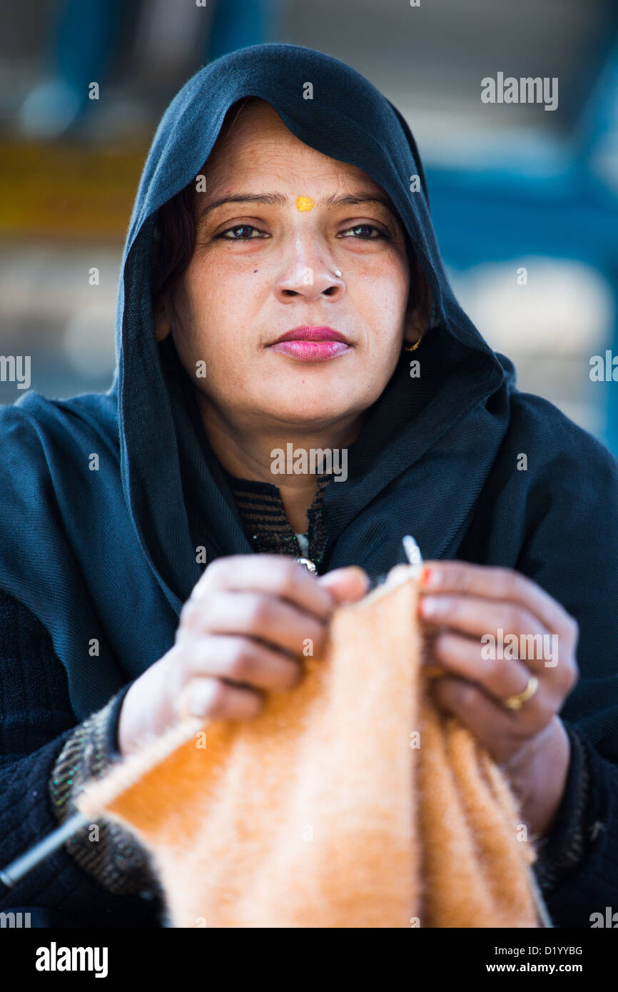 Indian woman knitting in New Delhi, India Stock Photo Alamy