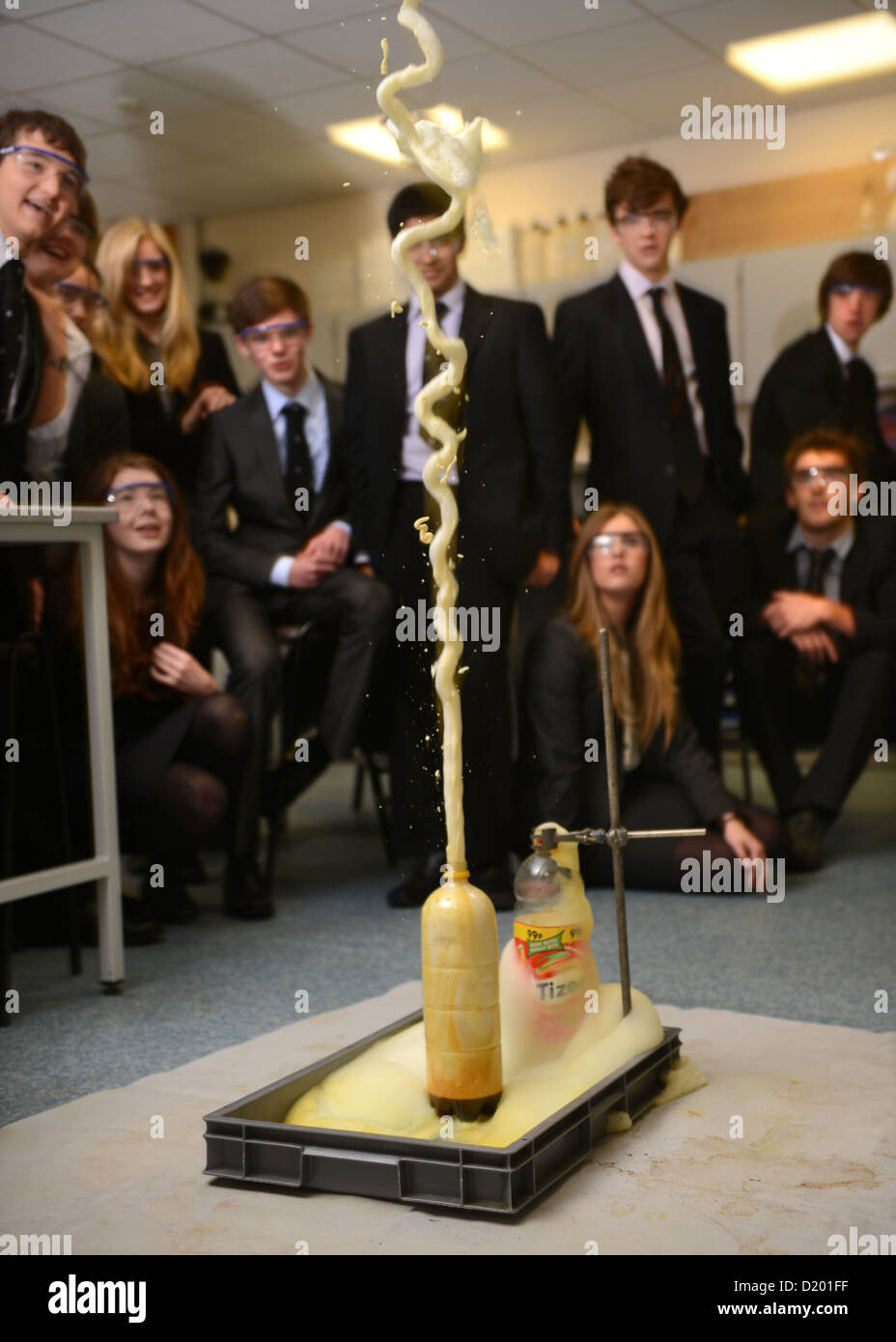 A teacher demonstrates a chemistry experiment during a science lesson at Pates Grammar School in Cheltenham, Gloucestershire UK Stock Photo