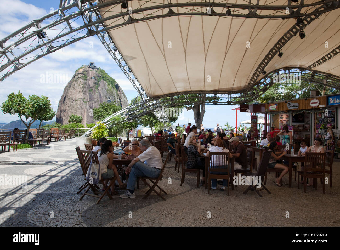 People at restaurant on middle station of Sugar Loaf mountain Sky Gondola cable car, Rio de Janeiro, Rio de Janeiro, Brazil, Sou Stock Photo