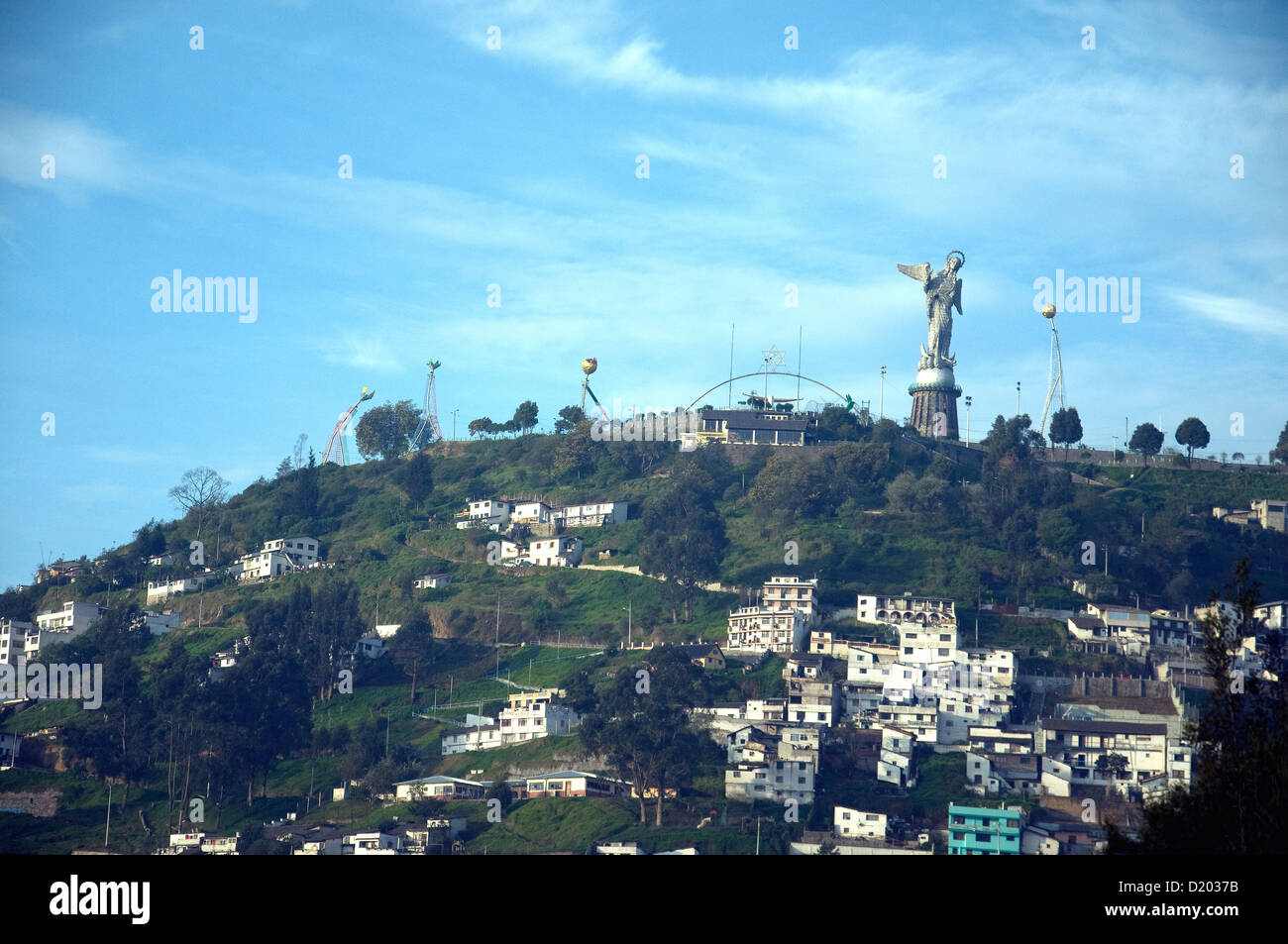 La Virgen del Panecillo, a winged Virgin or Madonna figure, sits atop a hill on the outskirts of Quiito, Ecuador's capital Stock Photo