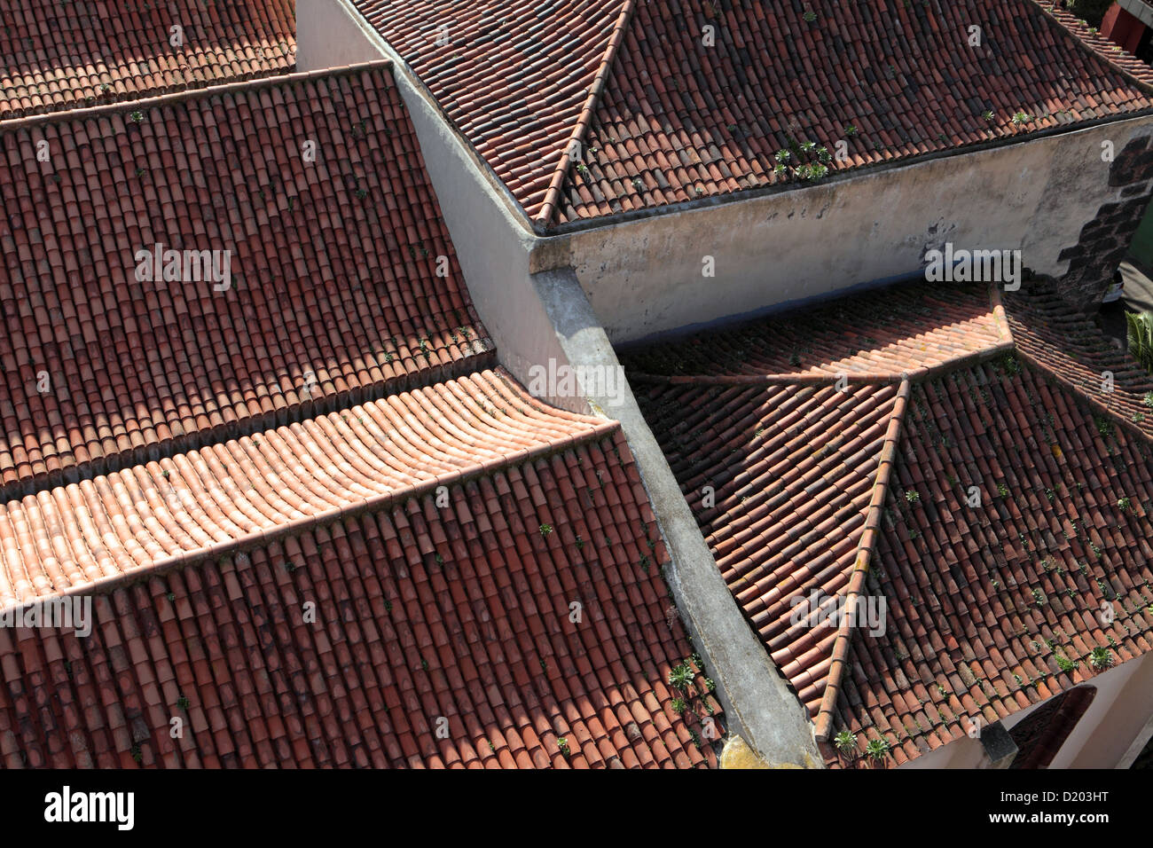 Overhead view of rooftops showing texture & color of old antique terracotta roof tiles, La Laguna, Tenerife. Stock Photo