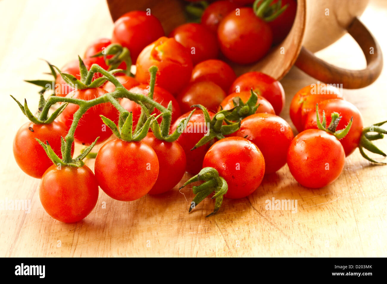 branch of red ripe cherry tomatoes Stock Photo - Alamy