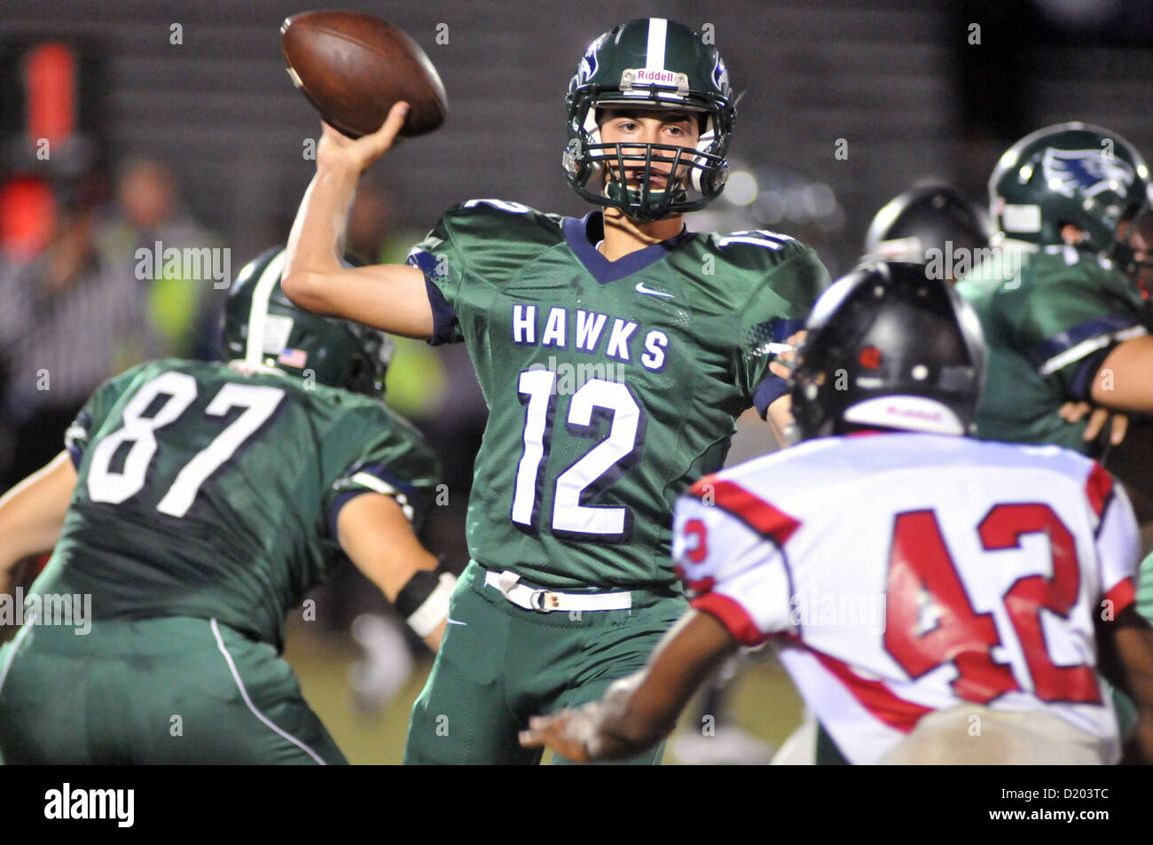American football player throw ball hires stock photography and images