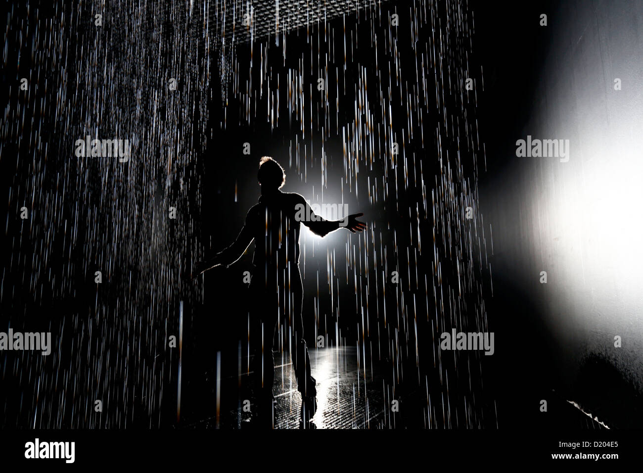 People Interact With The Rain Room Art Installation By