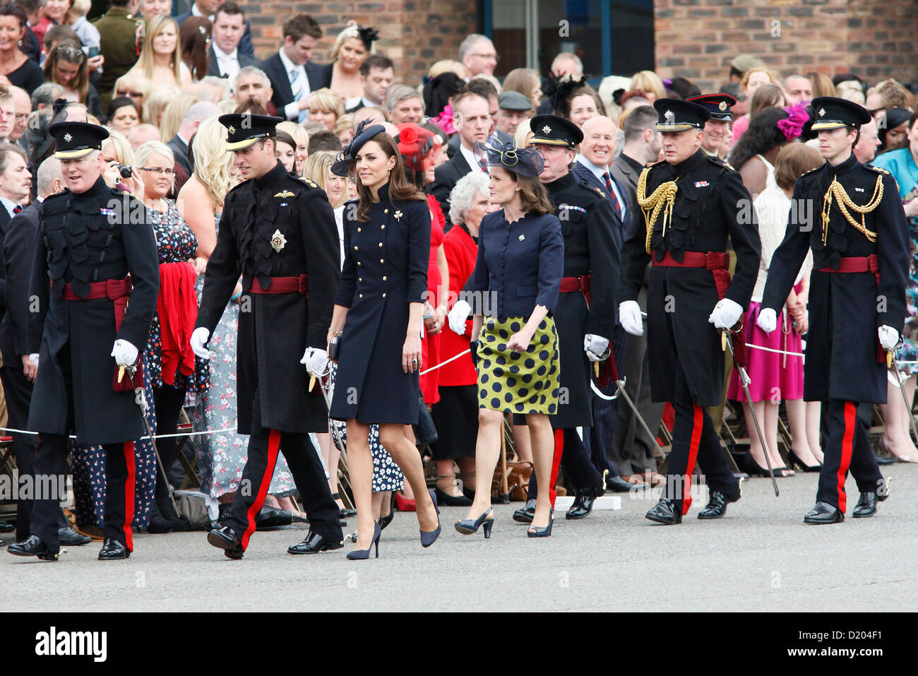 The Duchess of Cambridge, Kate Middleton, hands out operational medals to soldiers from 1st Battalion Irish Guards. Stock Photo