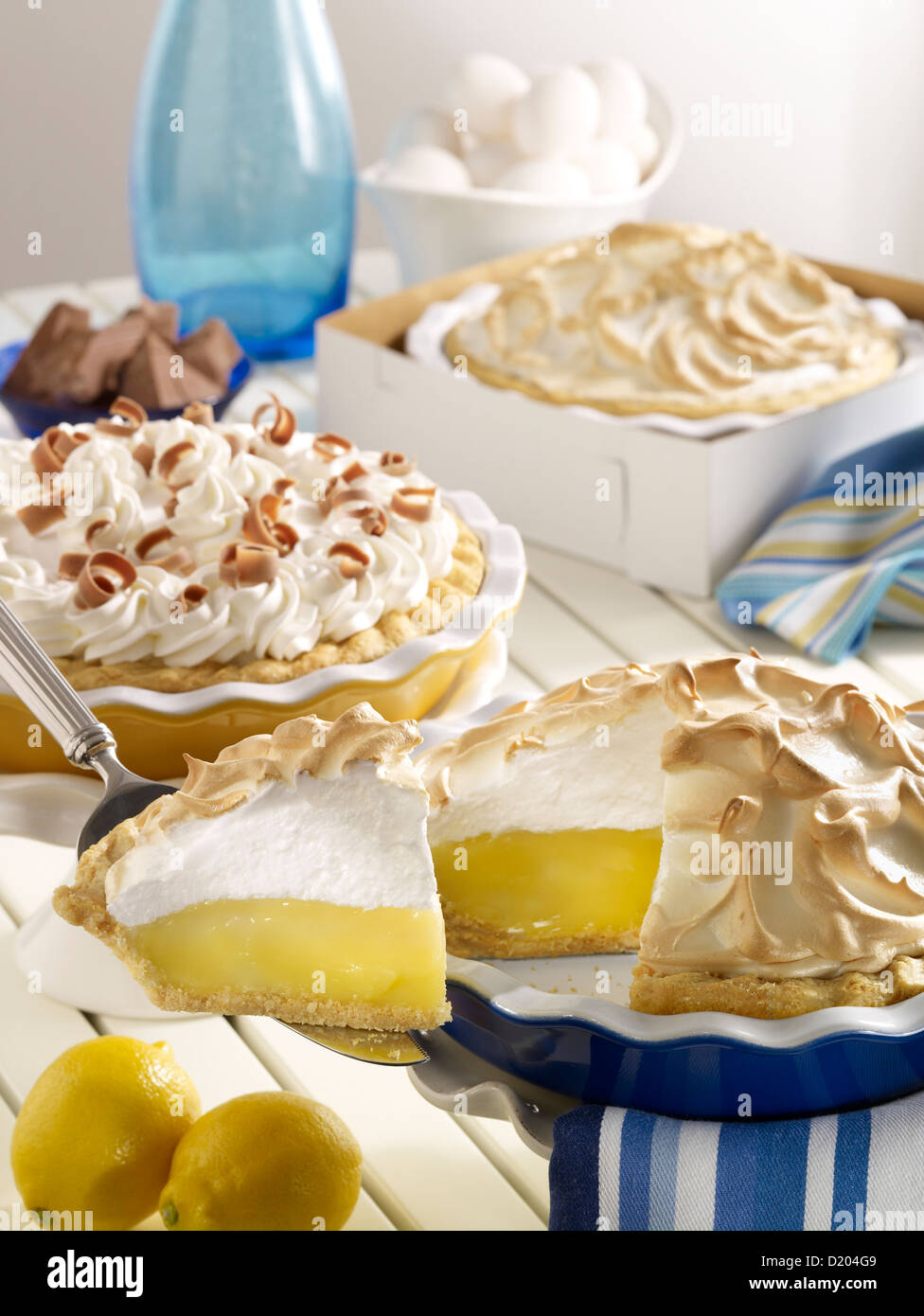 Lemon Meringue pie and chocolate pie with slice Stock Photo