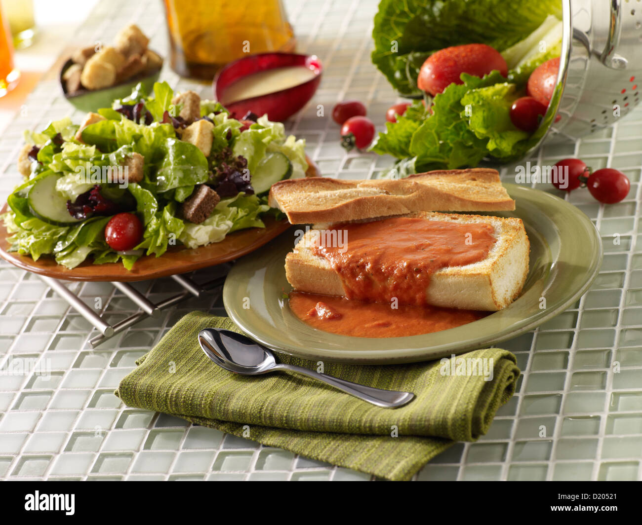 Tomato soup and fresh garden salad Stock Photo