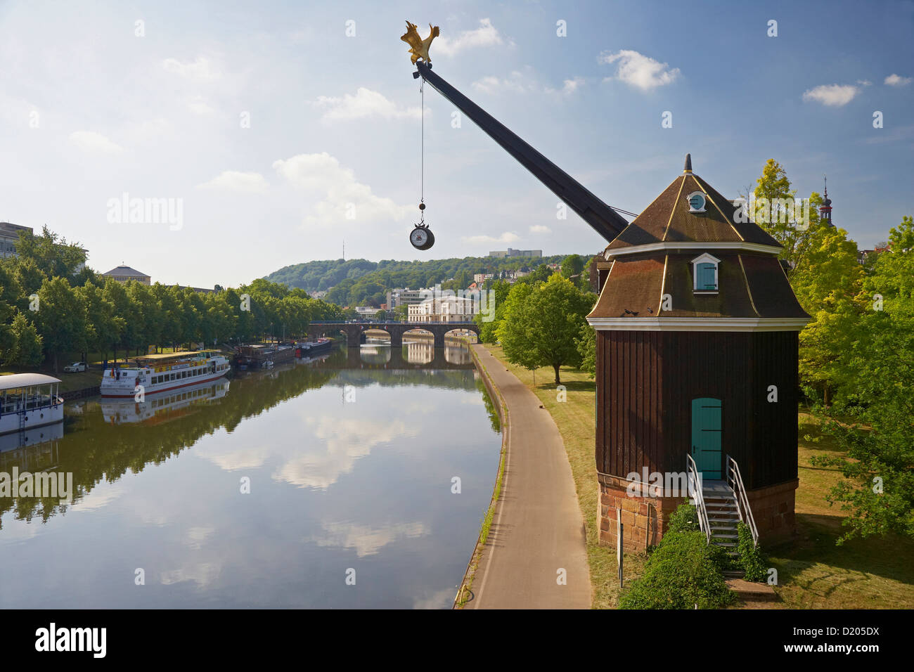View of crane Saarkran and Old Bridge at the river Saar in the sunlight, Saarbruecken, Saarland, Germany, Europe Stock Photo