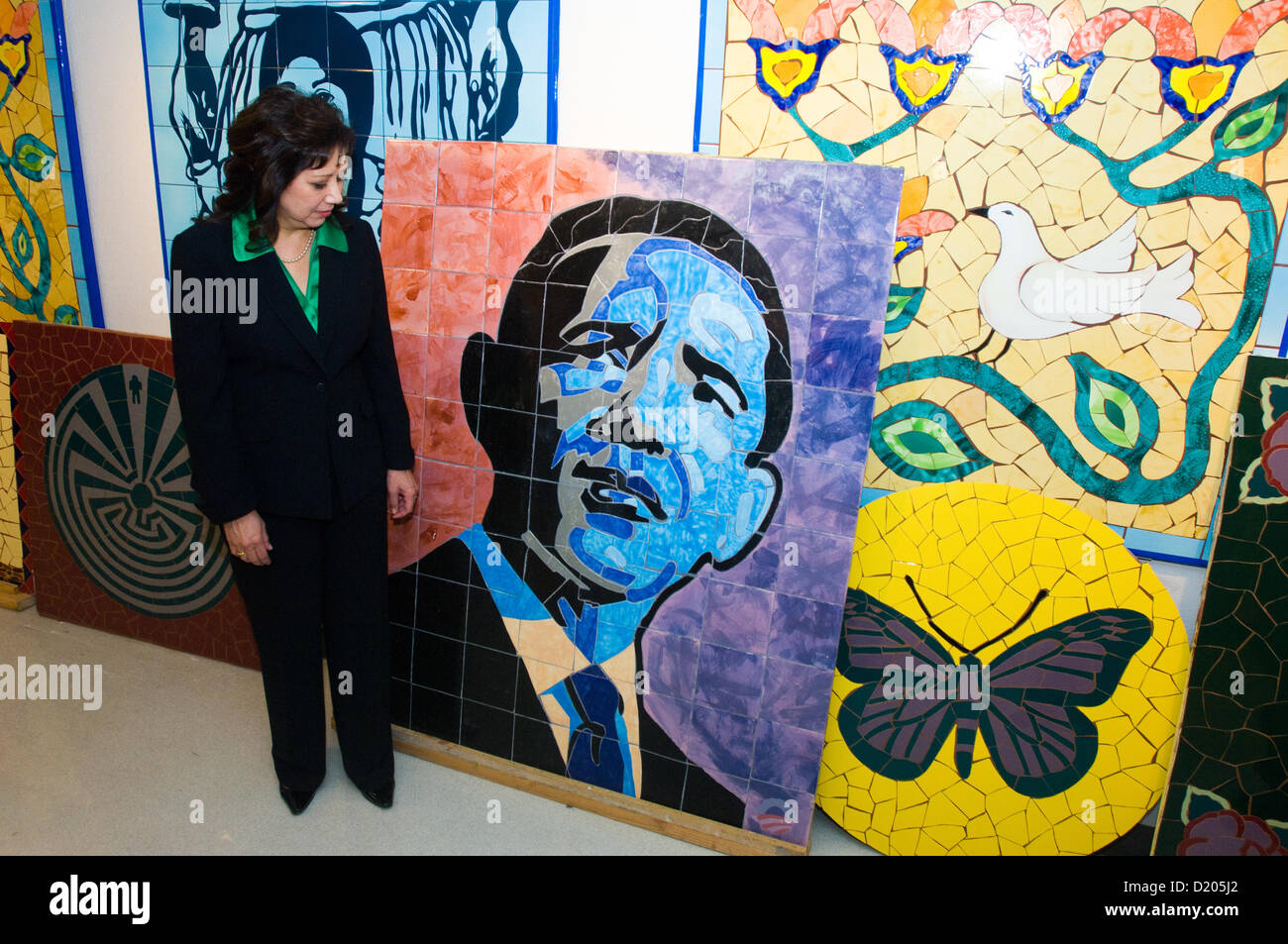 Feb. 16, 2010 - Tucson, Arizona, U.S - Secretary of Labor GILDA SOLIS looks at a mosaic of President BARACK OBAMA at Las Artes in Tucson, Ariz. in Feb. 2010.  Las Artes is an employment training center focusing on helping high school dropouts earn their GEDs while learning artistic trades including tilework and painting. (Credit Image: © Will Seberger/ZUMAPRESS.com) Stock Photo