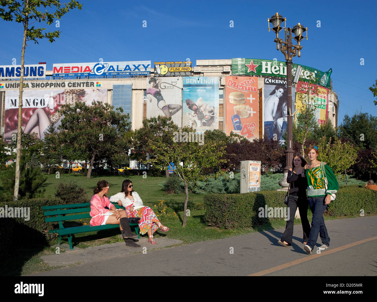Bucharest Romania Unity Square Young Women Sitting On A Park