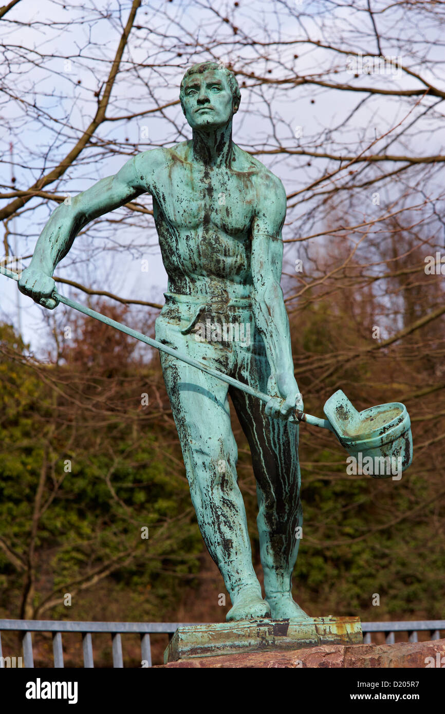 Sculpture of an iron-founder at Saarbruecken Brebach, Saarland, Germany, Europe Stock Photo