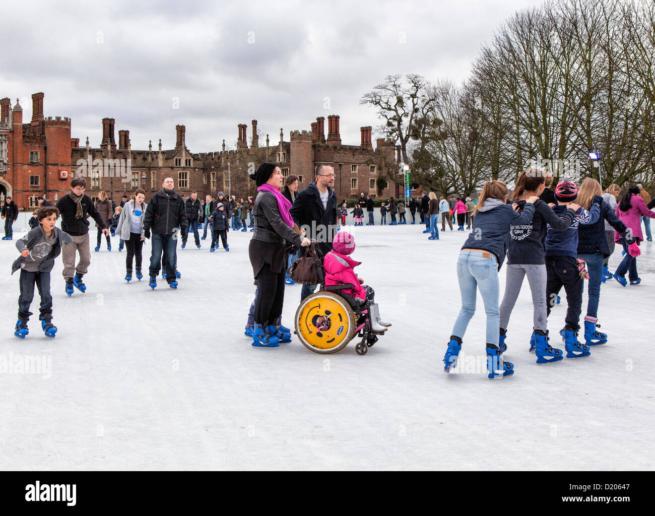 People skating on temporary ice rink at Hampton Court Palace, East