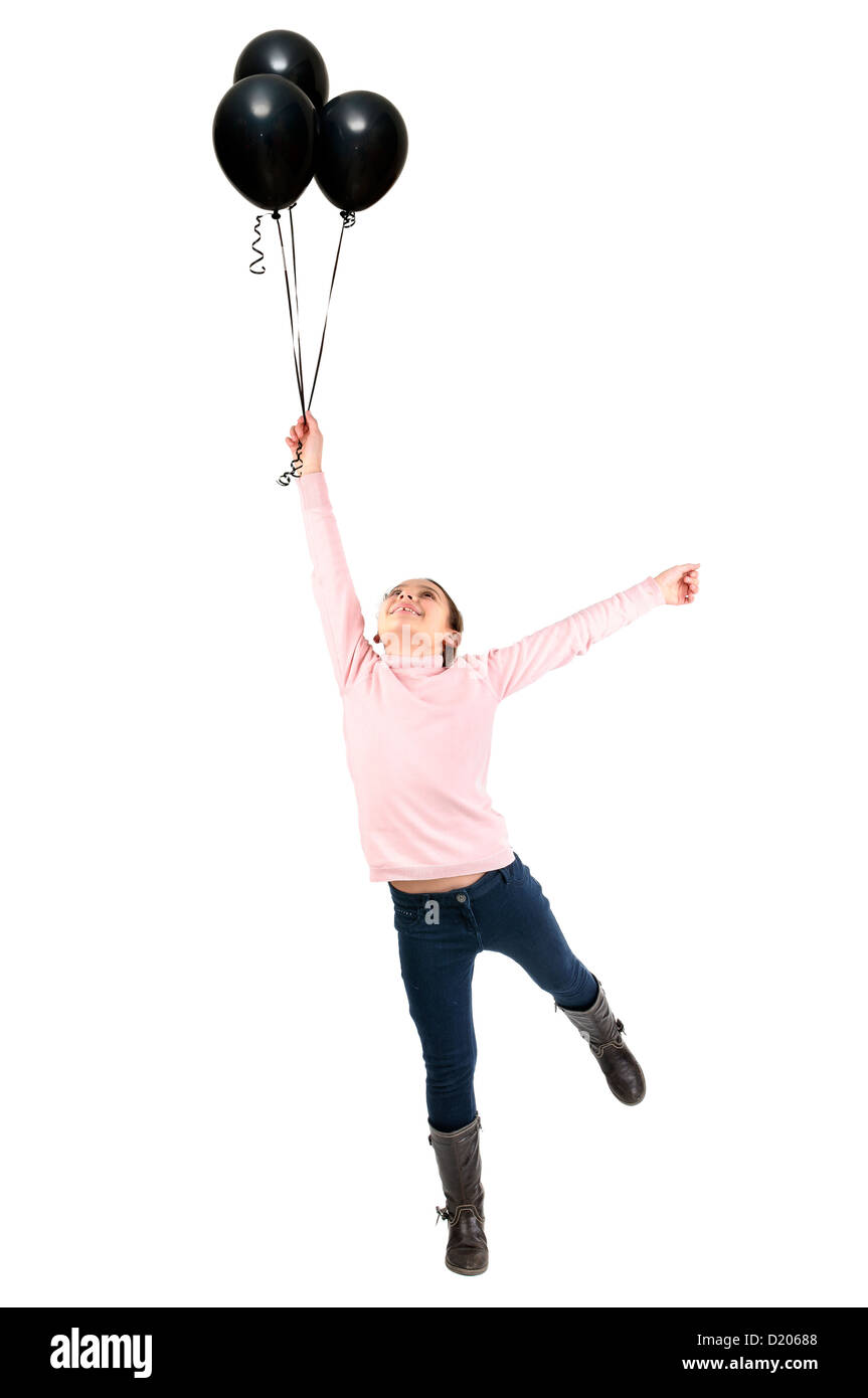 Young girl with black balloons isolated in white Stock Photo Alamy