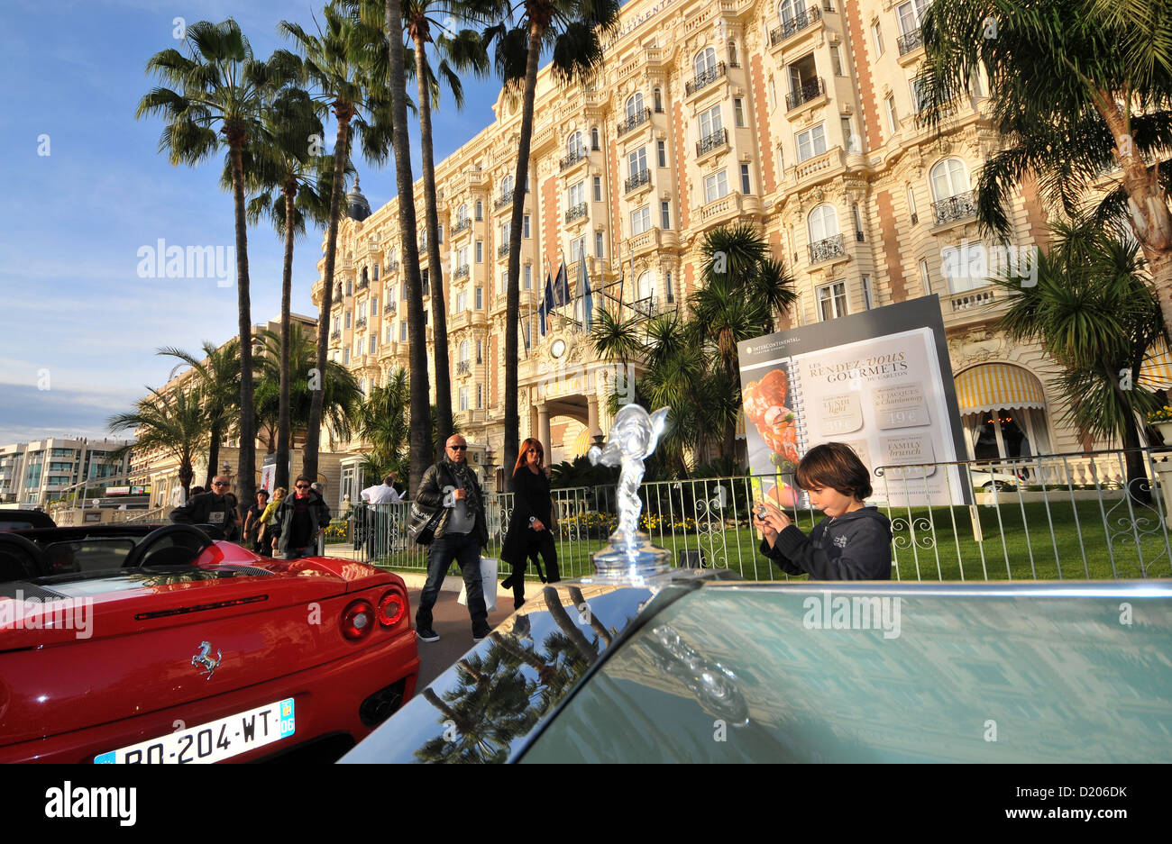 Cars and people in front of Carlton hotel, Cannes, Cote d'Azur, South France, Europe Stock Photo