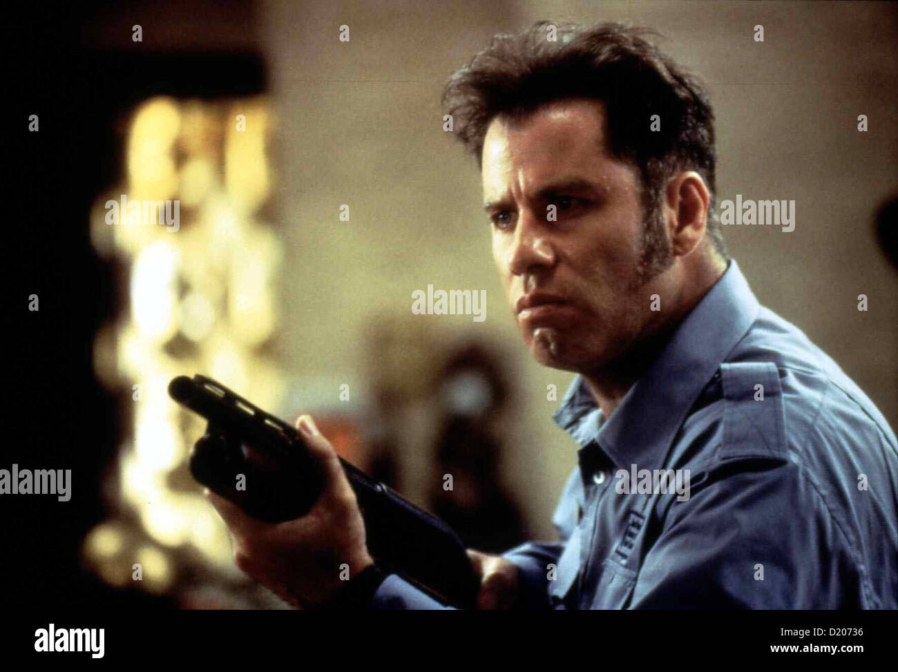 Mad City  Mad City  John Travolta Als Familienvater Sam Bailey (John Travolta) seinen Job als Sicherheitsbeamter in einem Stock Photo